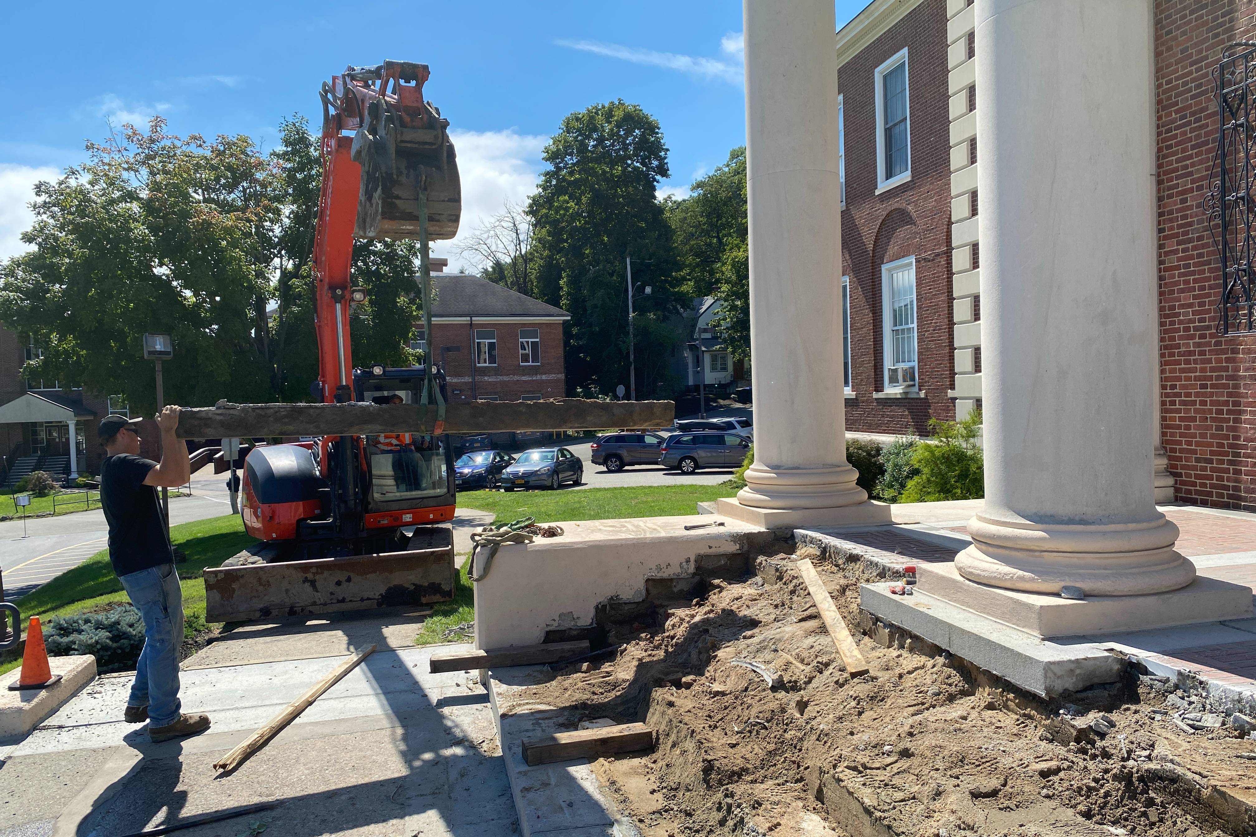 Workers installing news steps