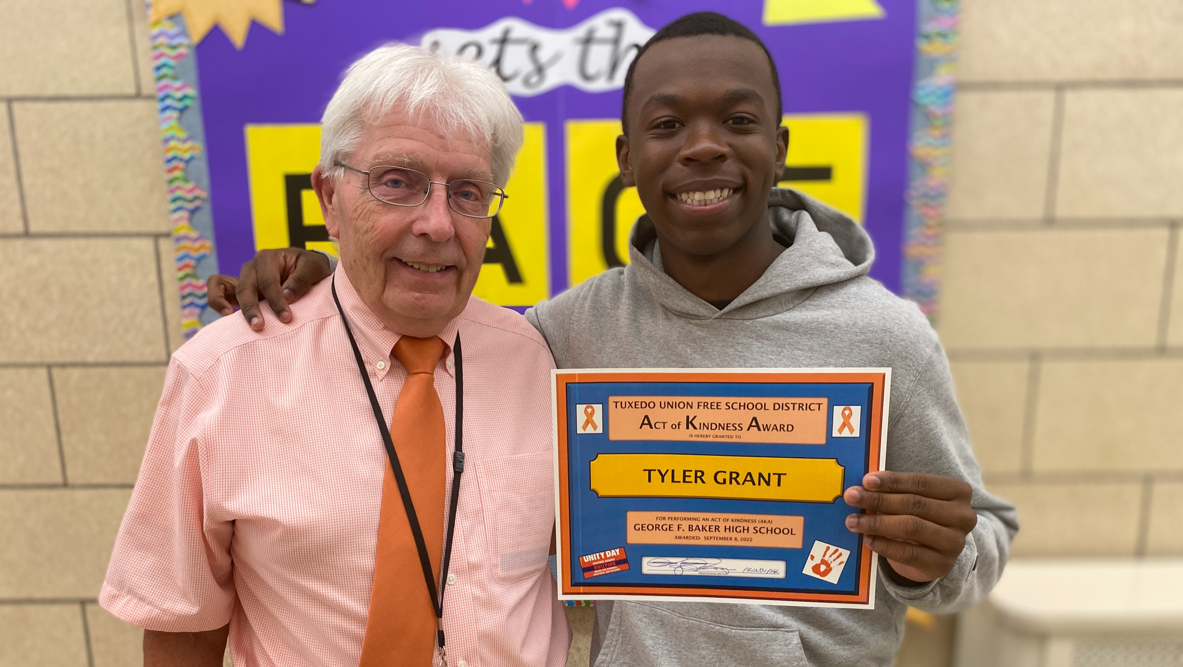 Principal Reese with George F. Baker High School student Tyler Grant
