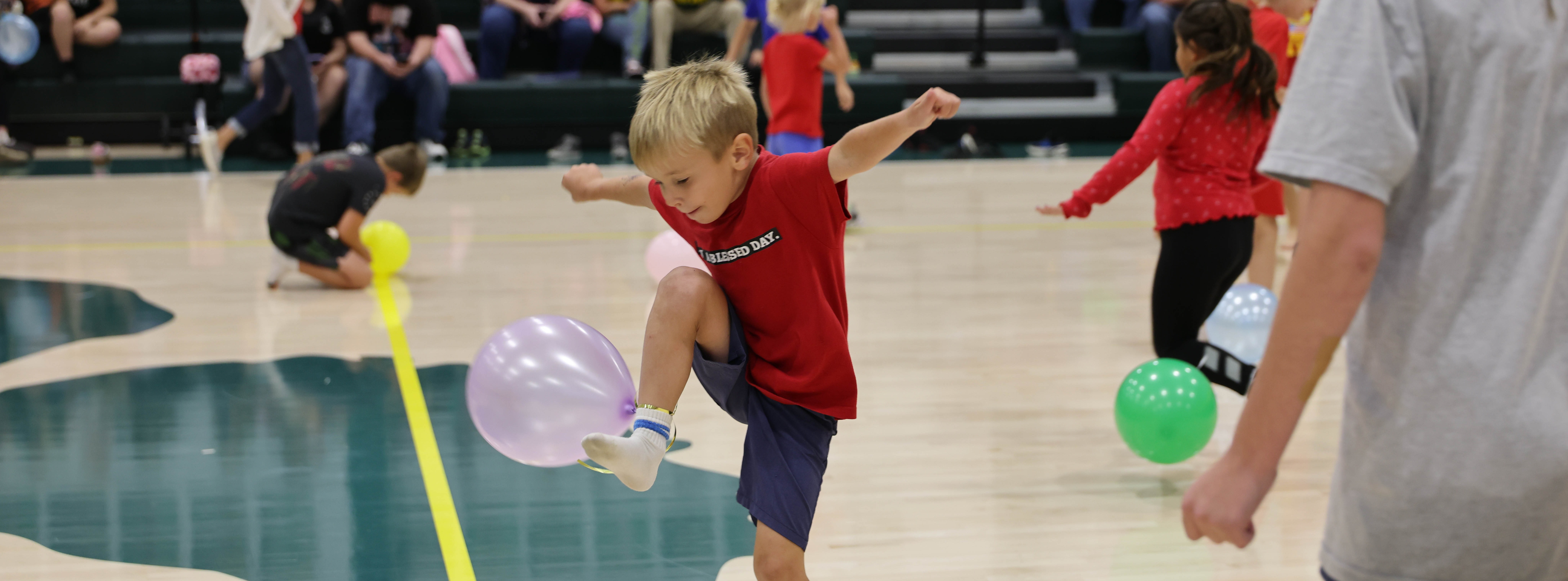 Barret Durbin stomping a balloon