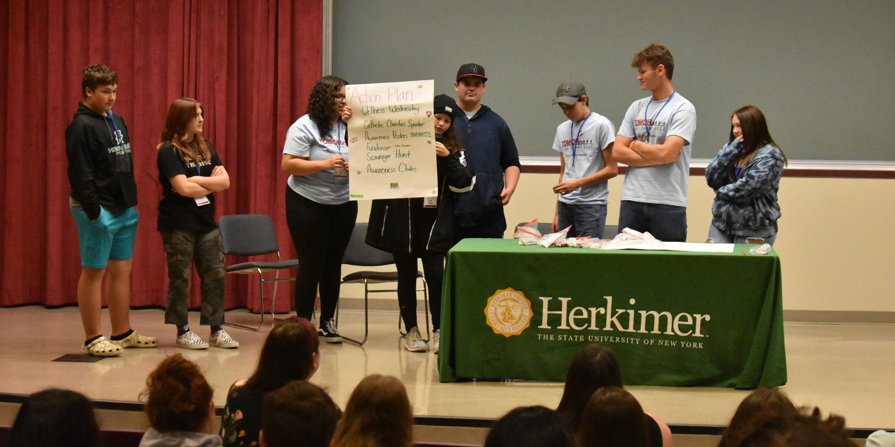 VP-TECH students presenting on stage during the Youth Summit at Herkimer College