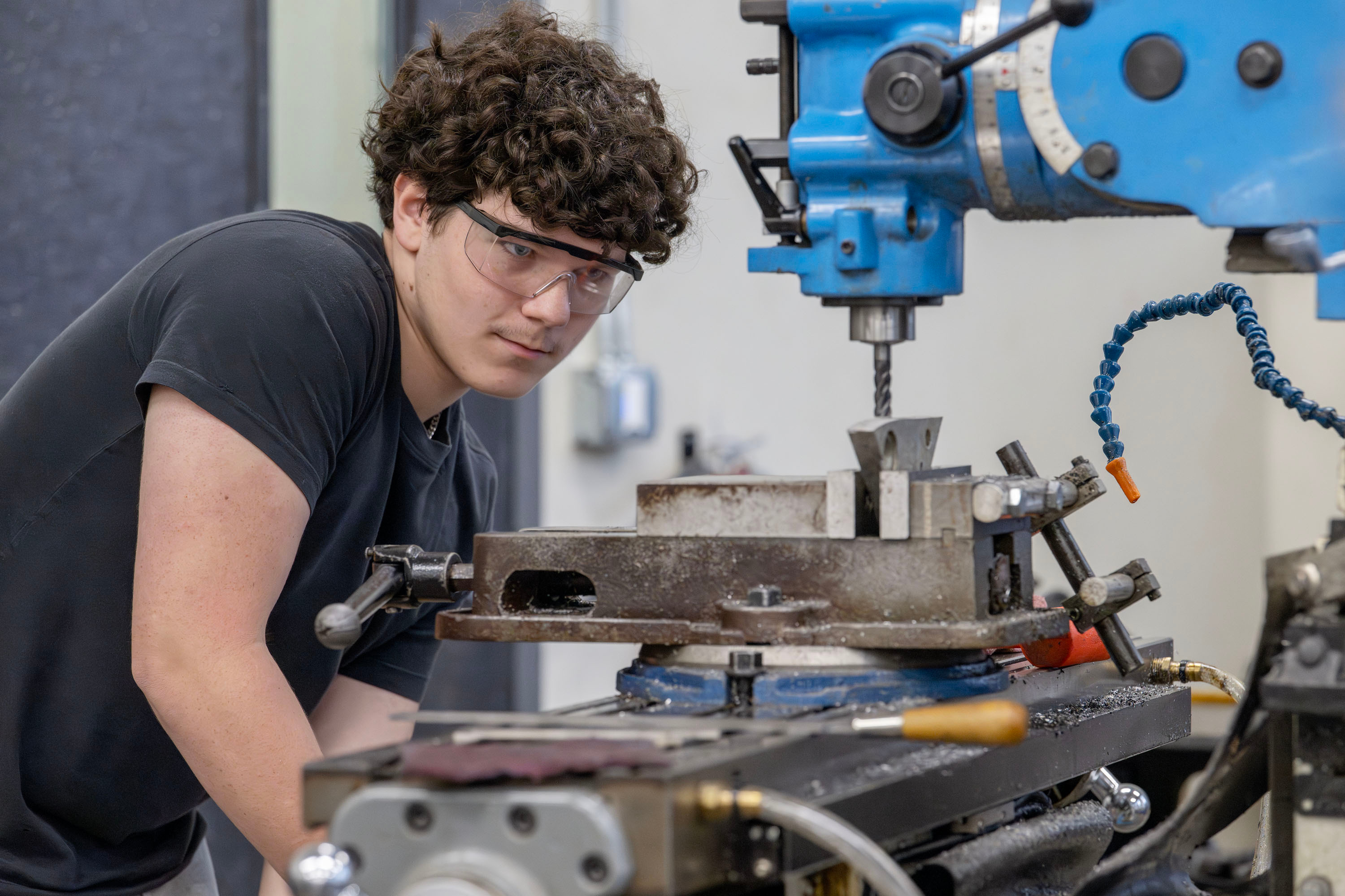 Advanced Manufacturing student operating machinery