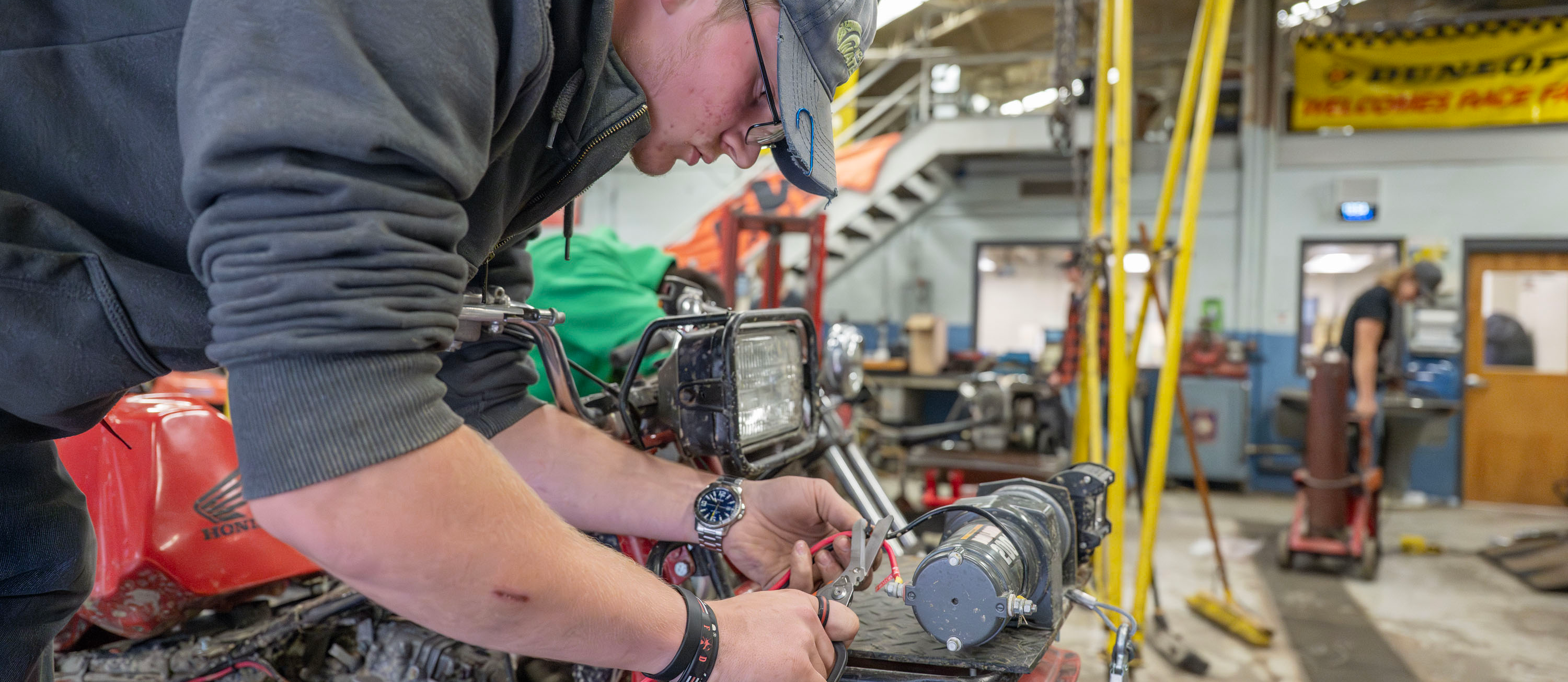 Power Sports student working in lab