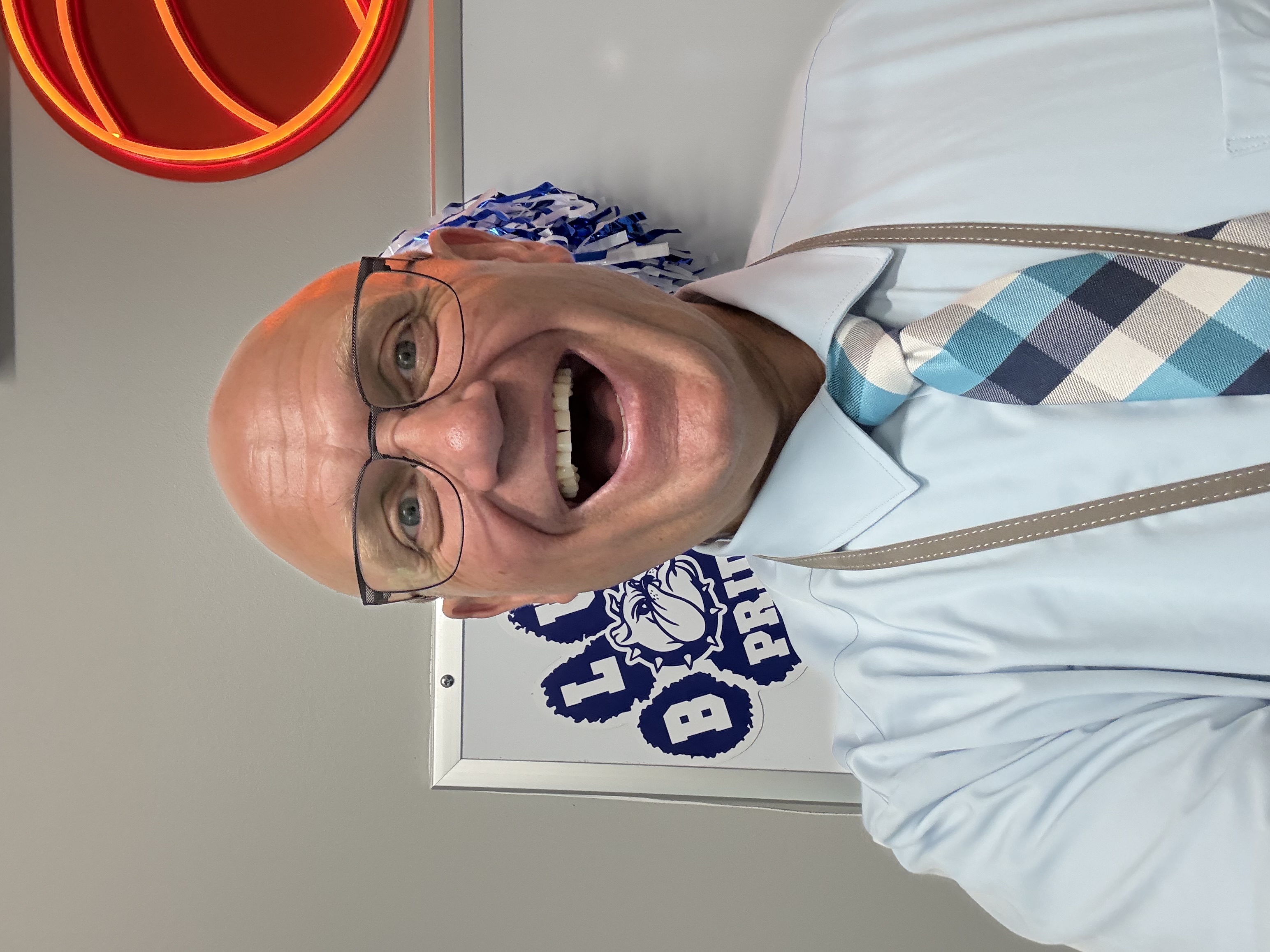Picture of Bob Phillips - blue shirt and multi-colored blue tie