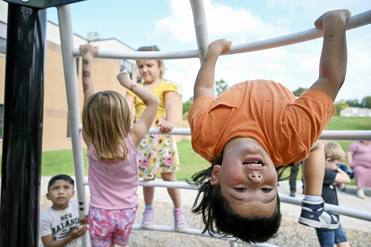 kid in jungle gym