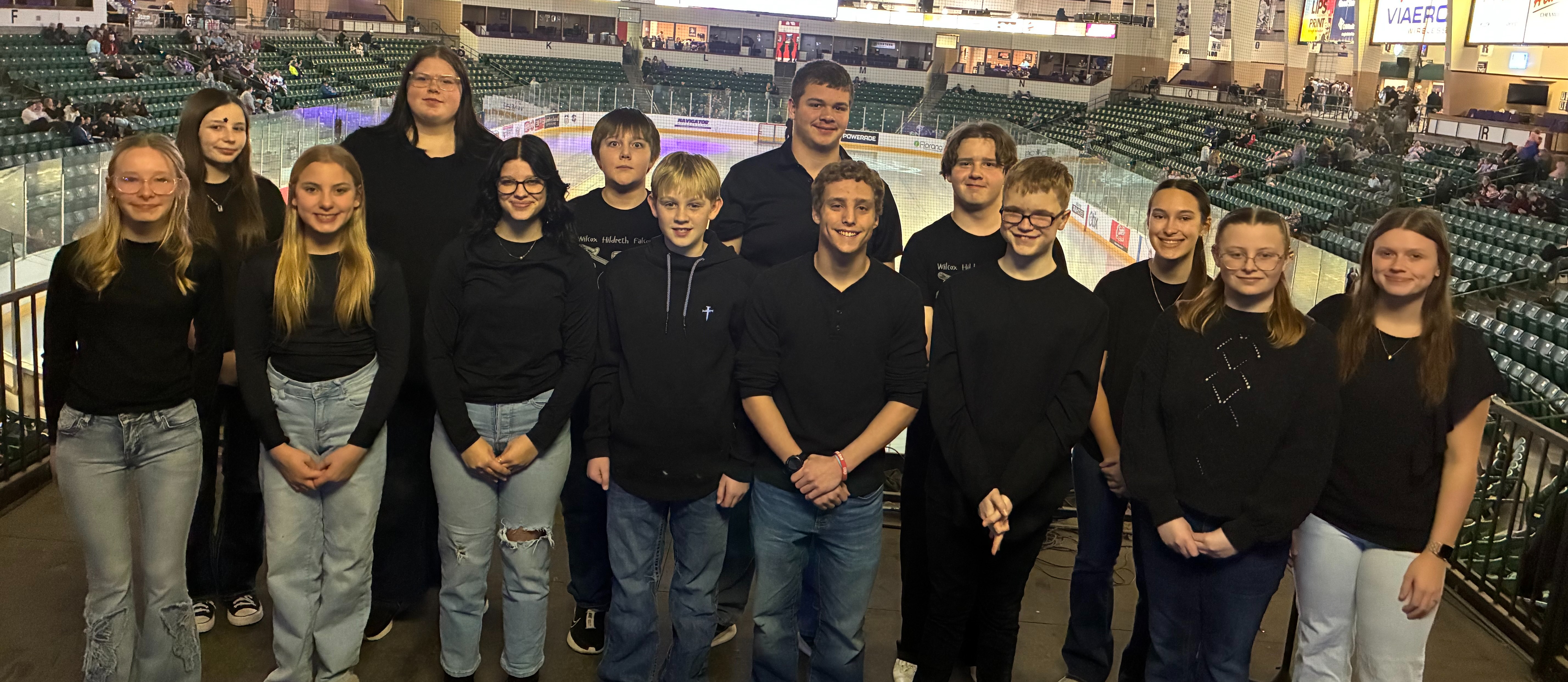 Choir sings the National Anthem at Storm Hockey! 🏒 
