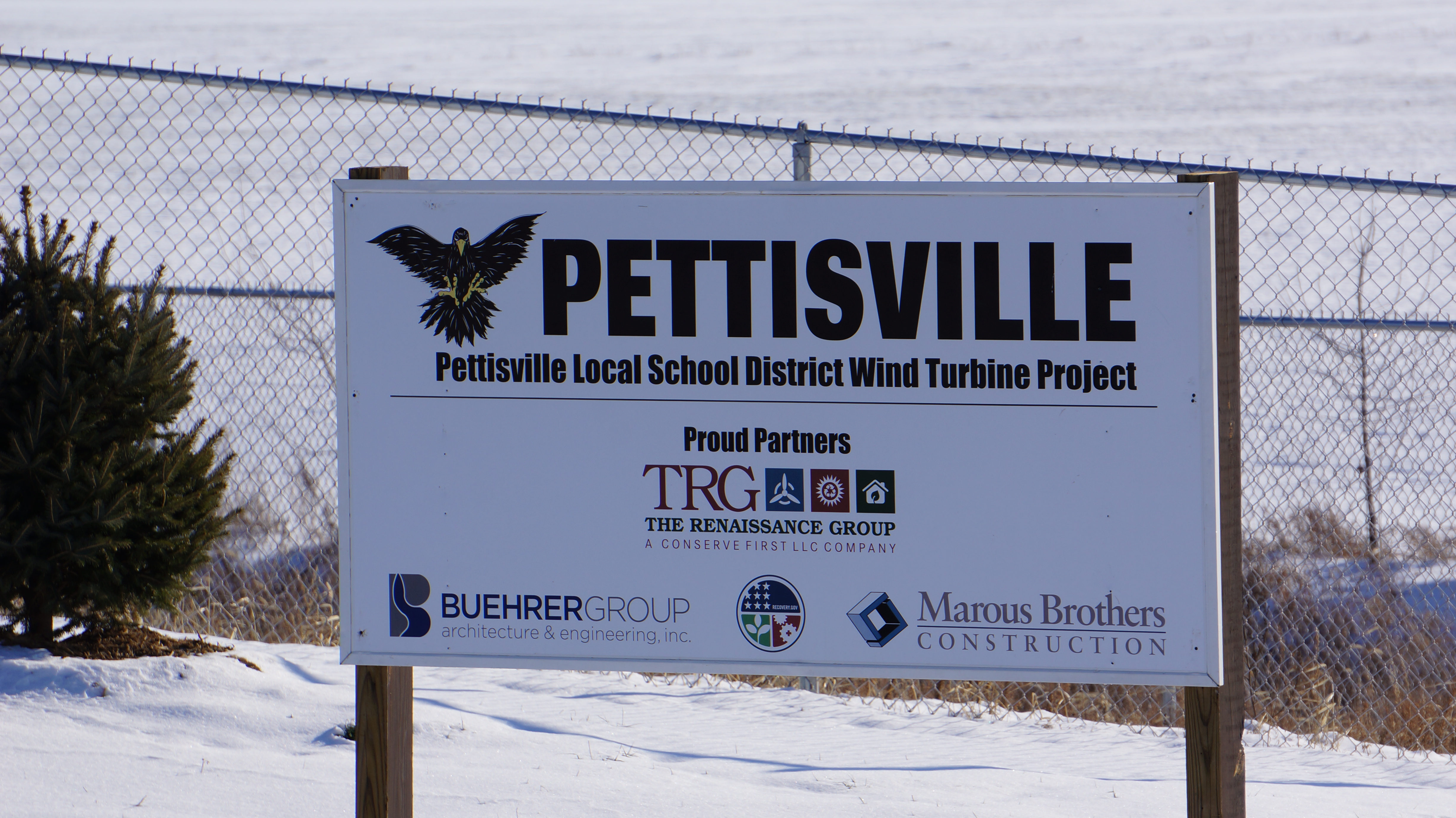 A picture of the pettisville wind turbine project sign 
