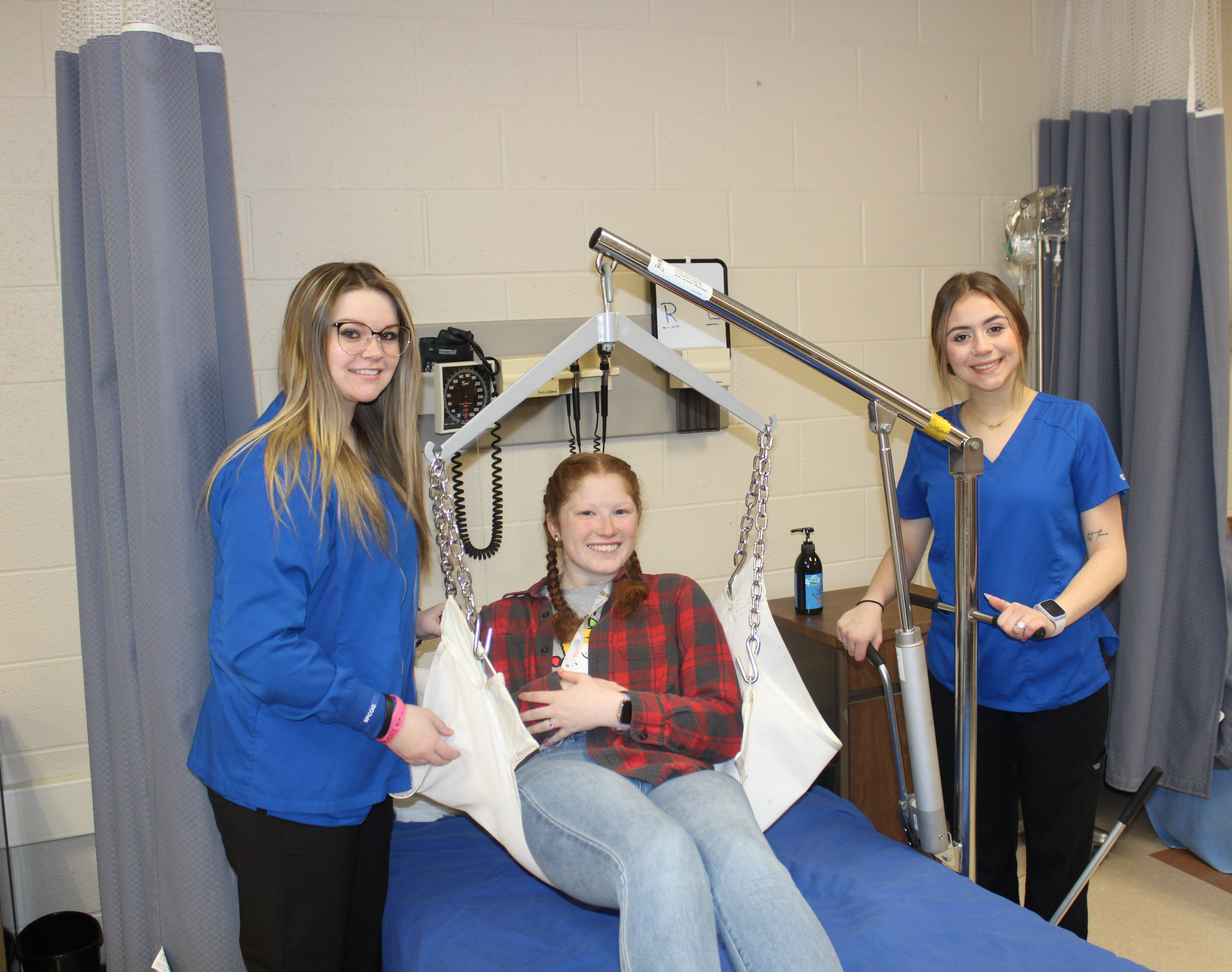 health assistant students practicing in the classroom