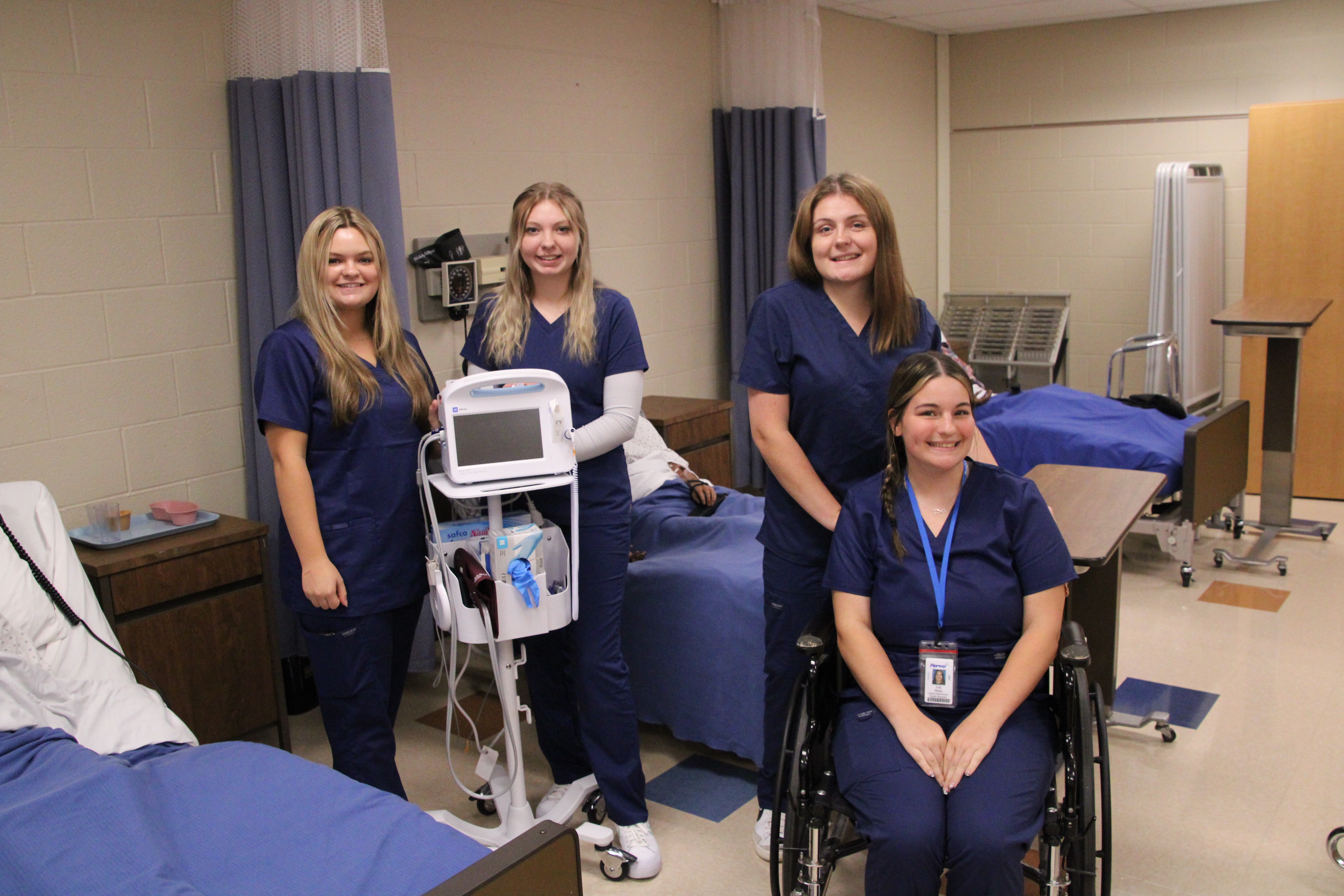 health assistant students practicing in the classroom