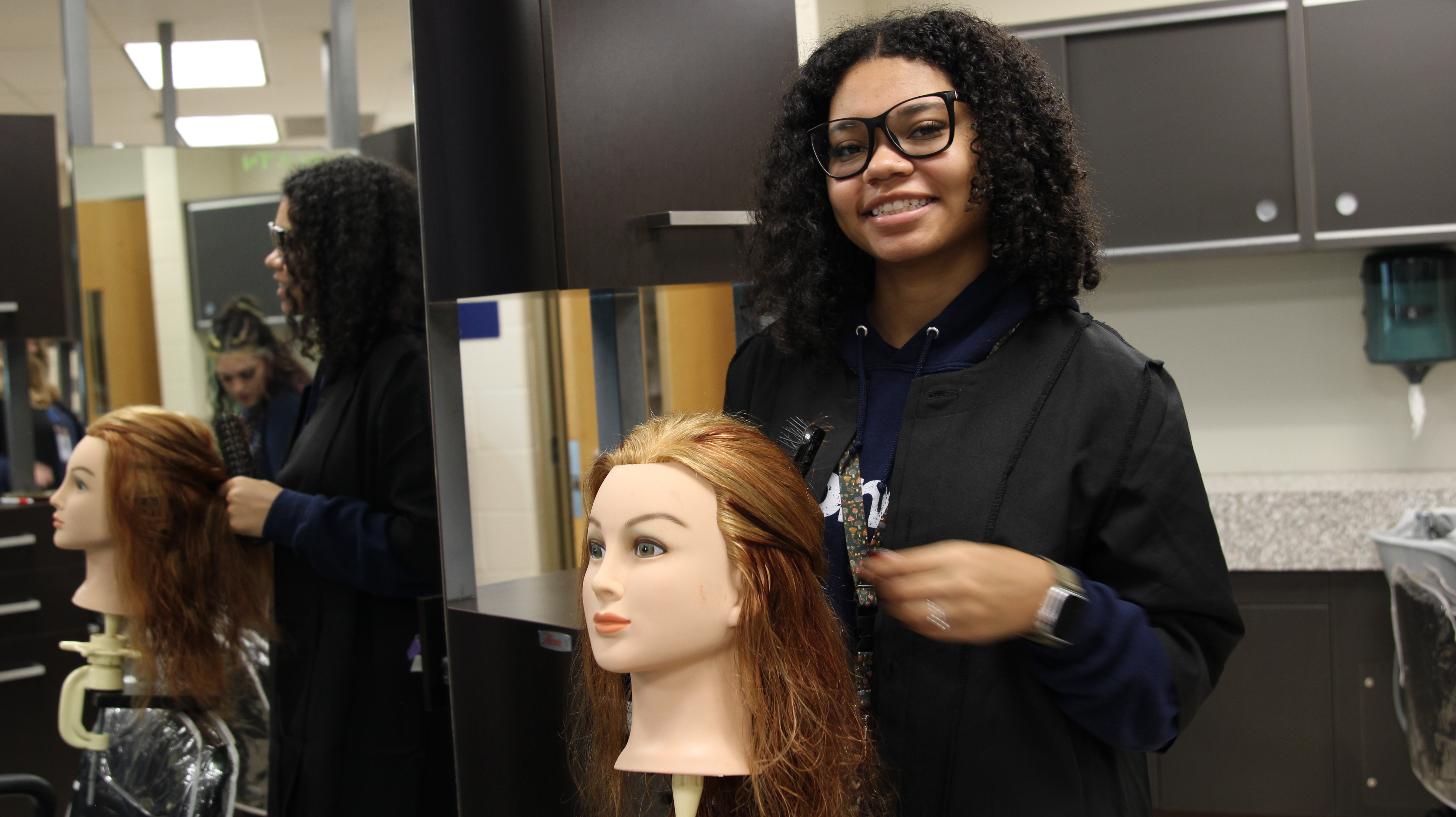 cosmetology students in at work
