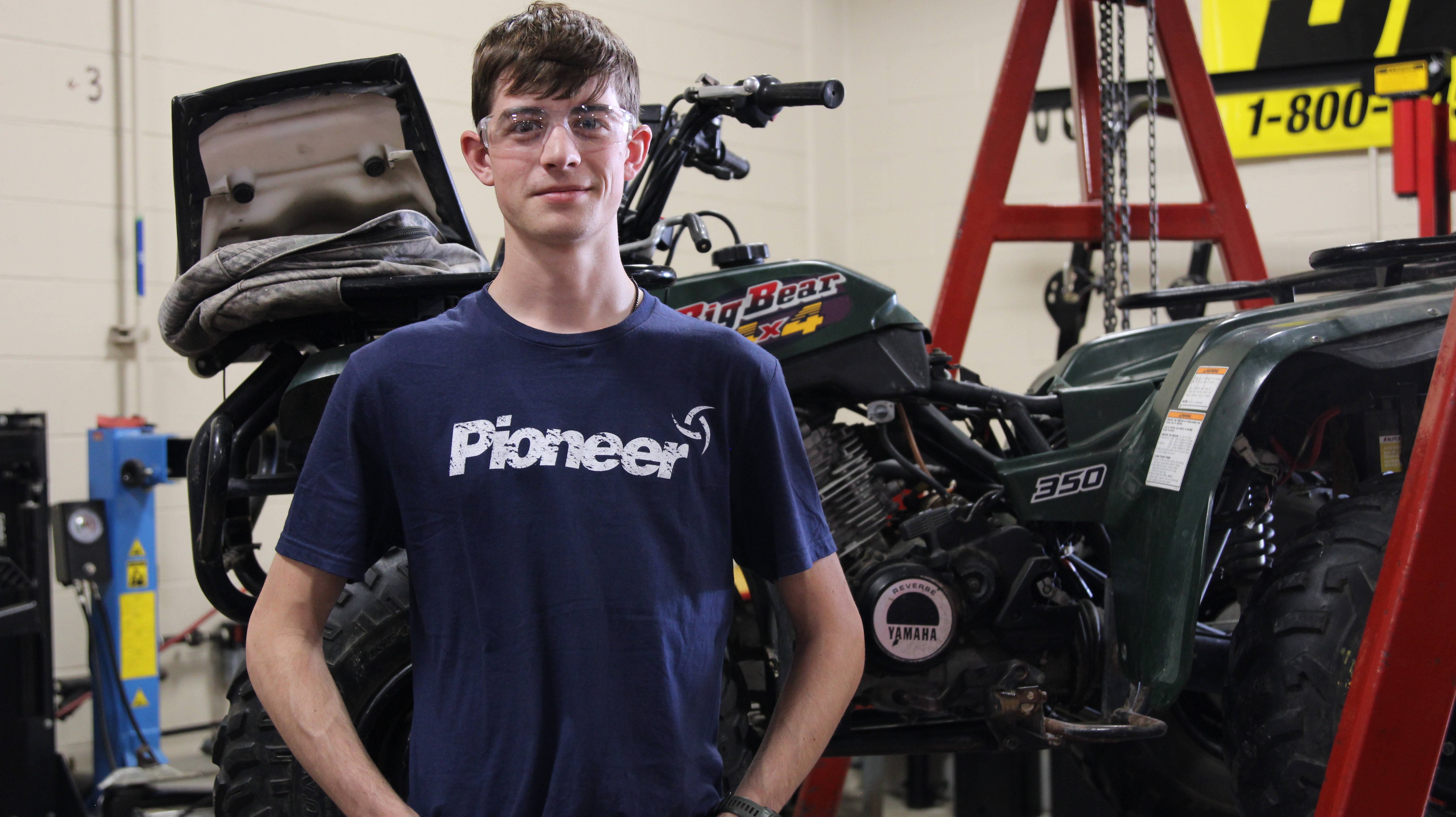 power equipment mechanics student working in the classroom