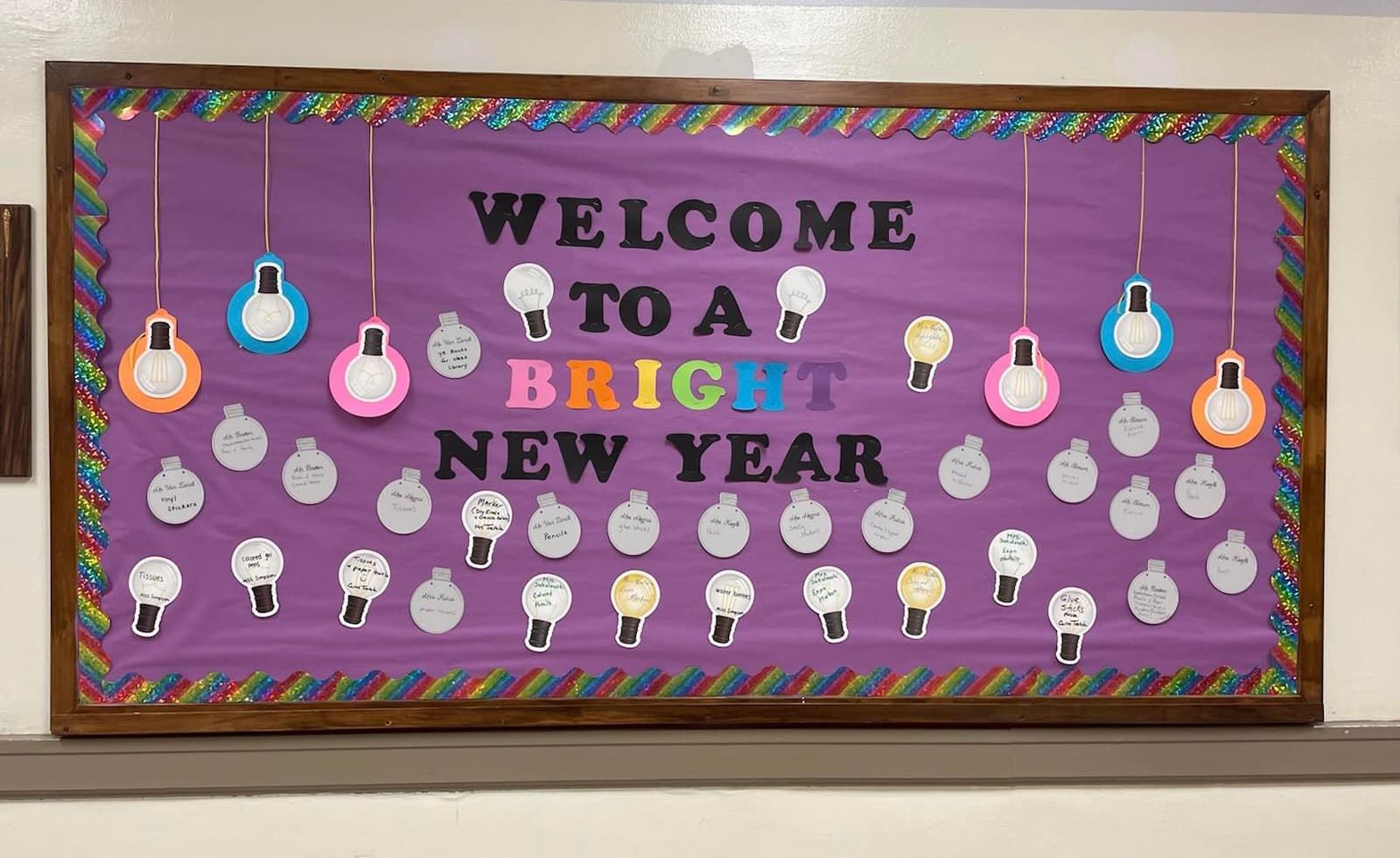 Welcome Back to a Bright Year- Lightbulbs with teacher wishes bulletin board