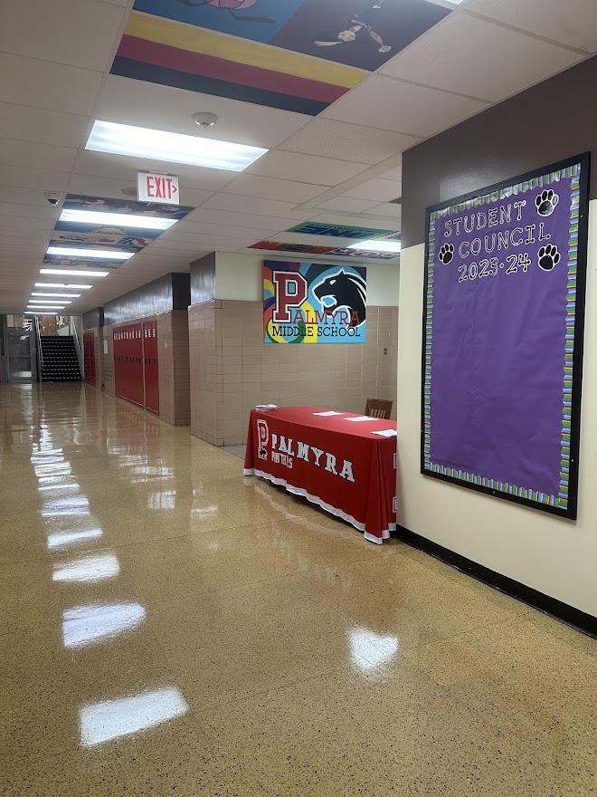 PHS | MS brown hallway from front office towards steps with super shiny floors!