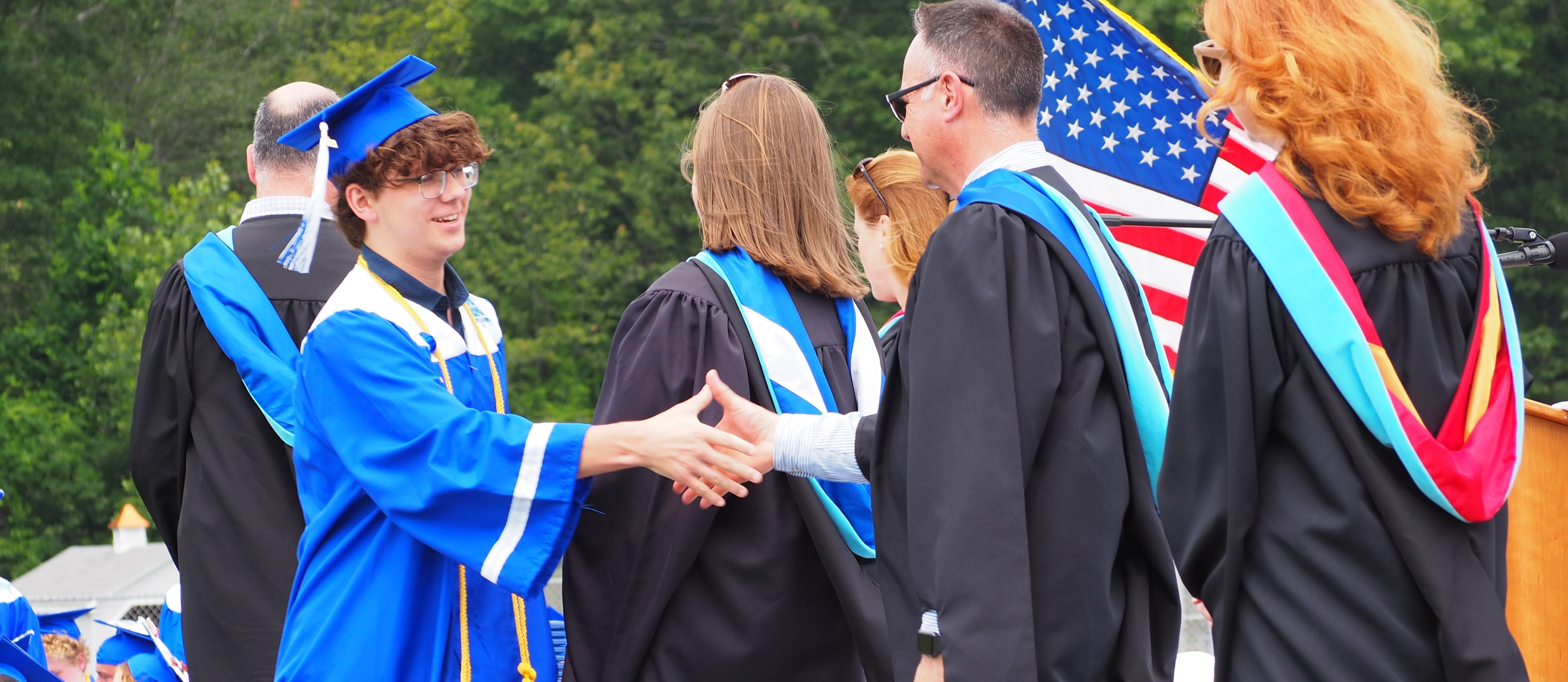 Graduate handshake