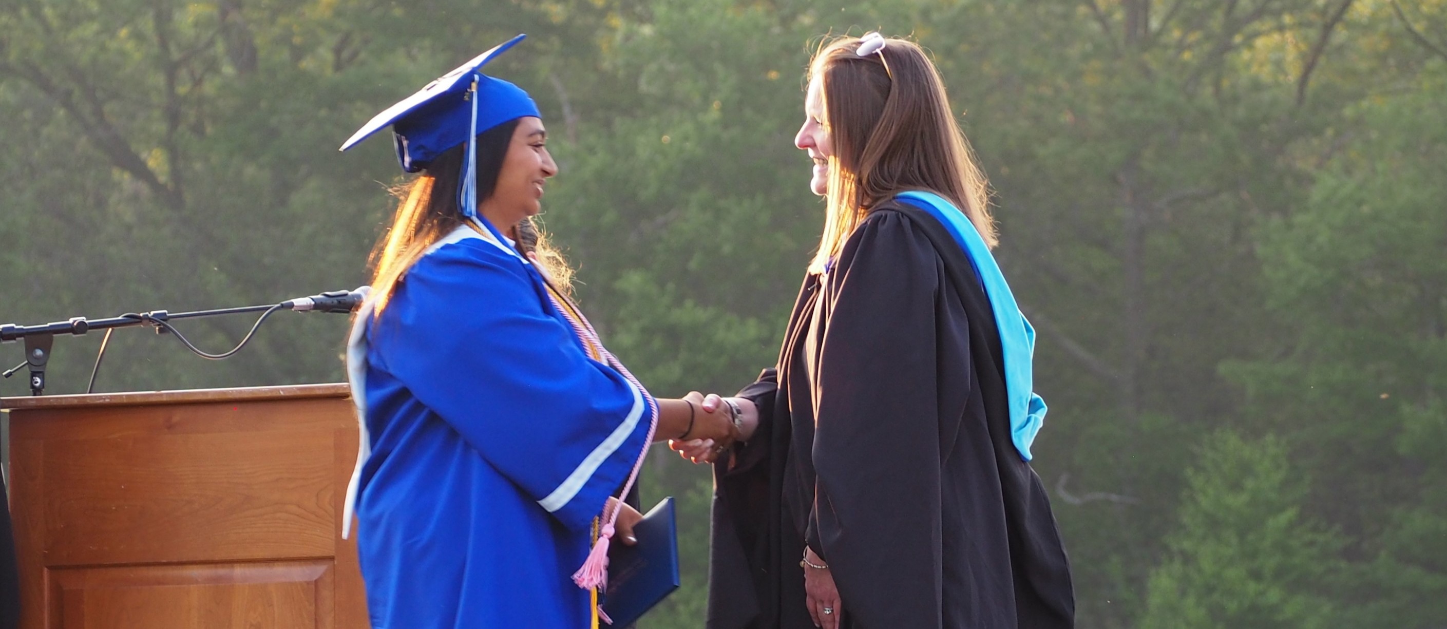 Graduate handshake