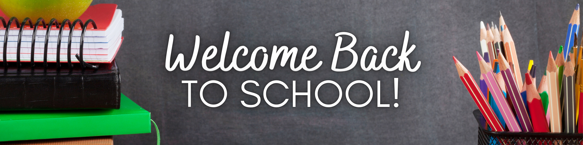 Welcome back to school written in white on a black board