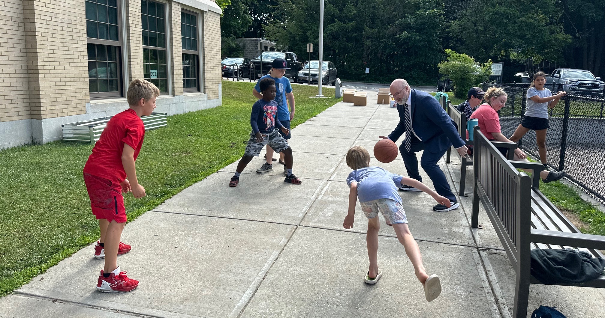 Superintendent plays 4squre with students