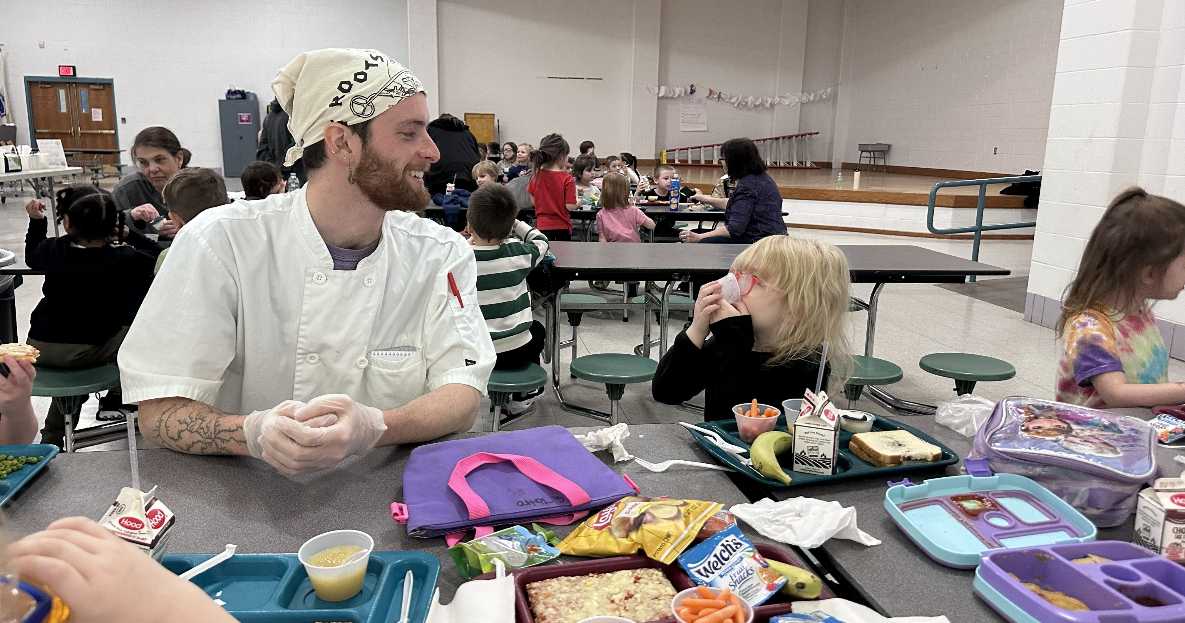 Student taste testing during lunch at Brayton with Chef Kyle