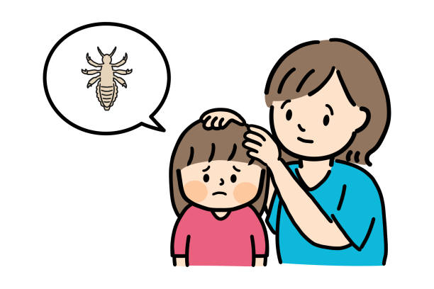 Image of an adult checking a child's head for lice