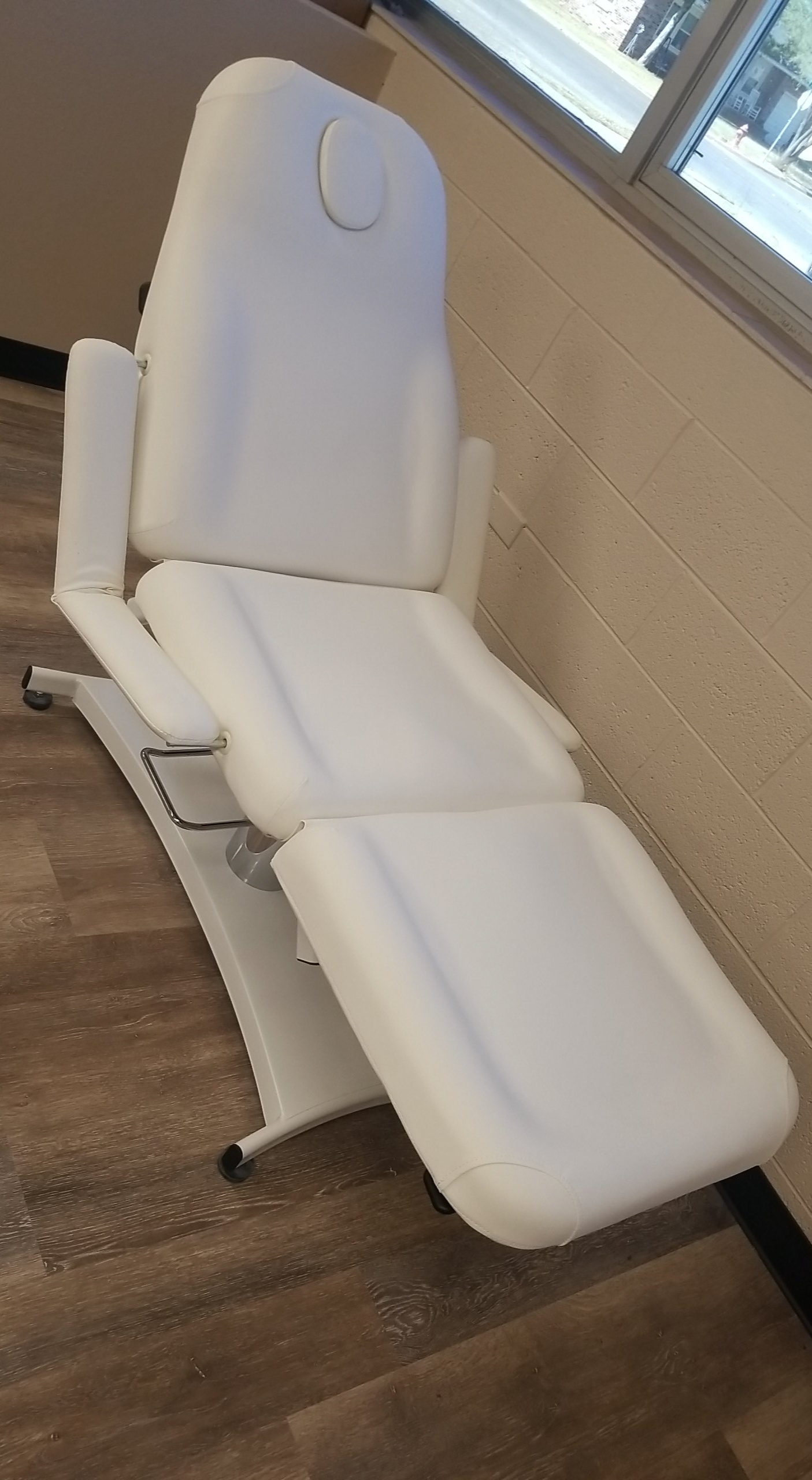 CTE Updates - large white reclining styling chair