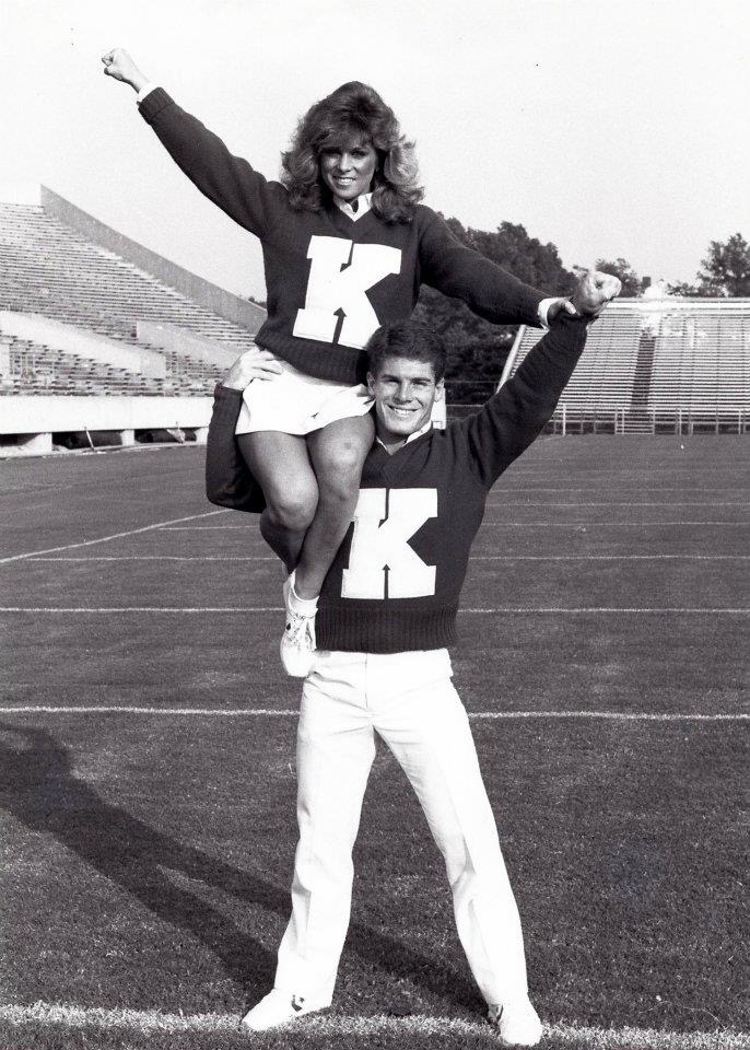 A photo of Dale Baldwin and a cheerleader.