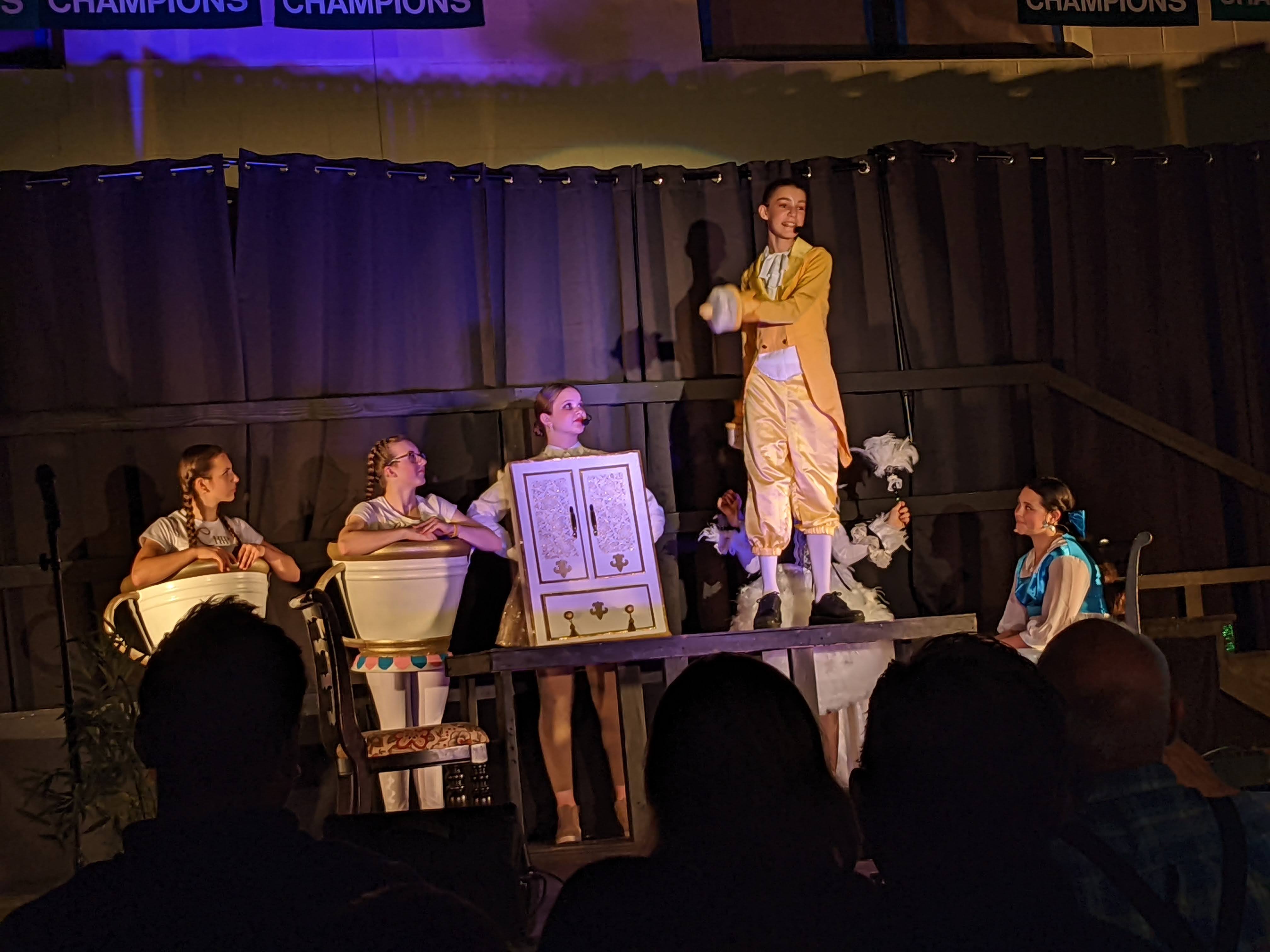 student performers in Beauty and the Beast