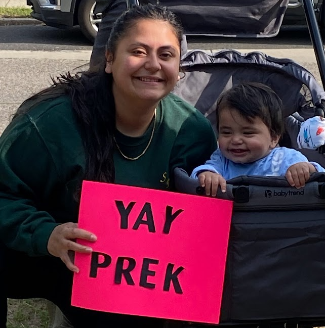 Mom and a Future St. Peter Saint cheering on Pre-K in the Race for Education