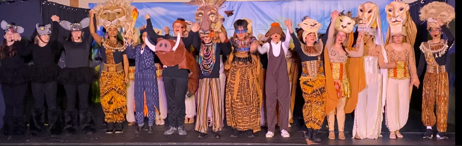 The Cast of the Lion King in costume