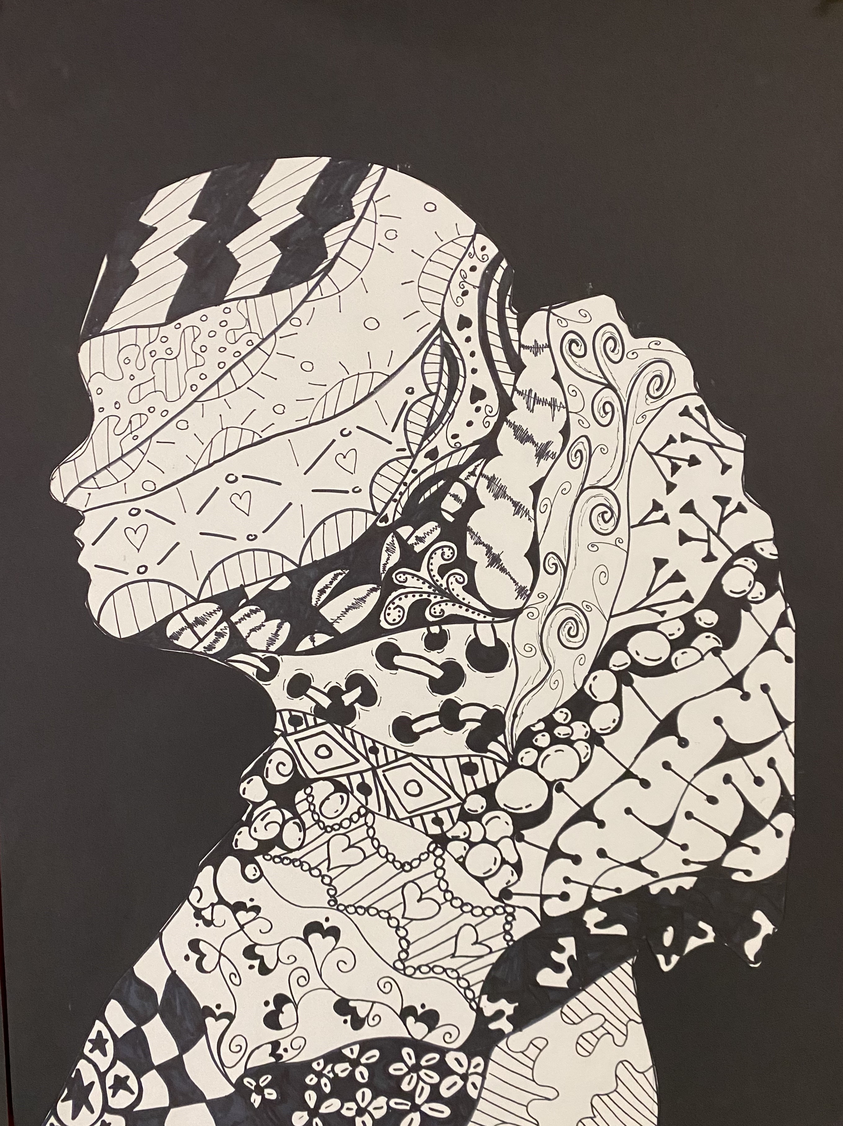a silhouette using zentangle drawings