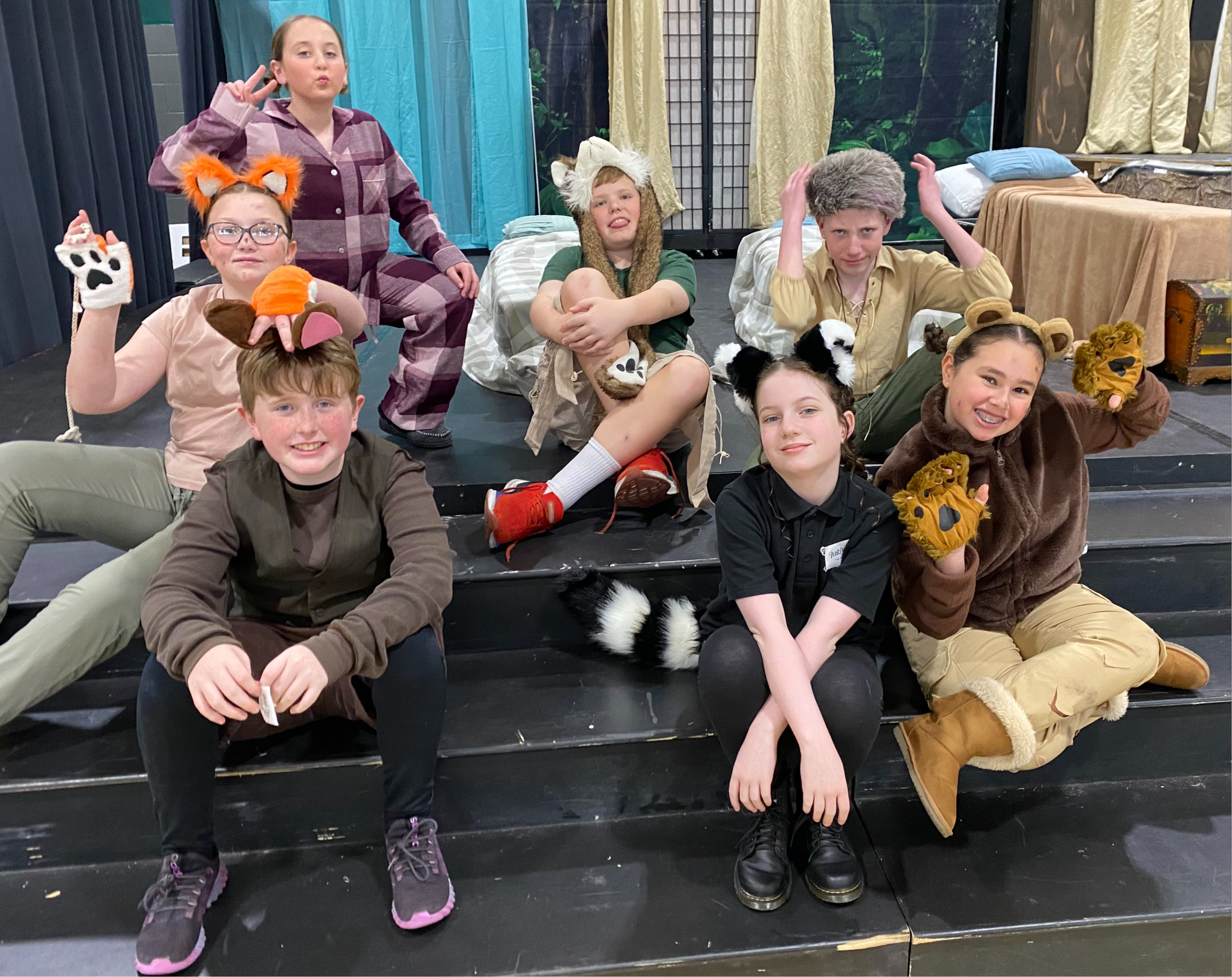 A group of 7th grade boys and girls dressed like the Lost Boys in Peter Pan