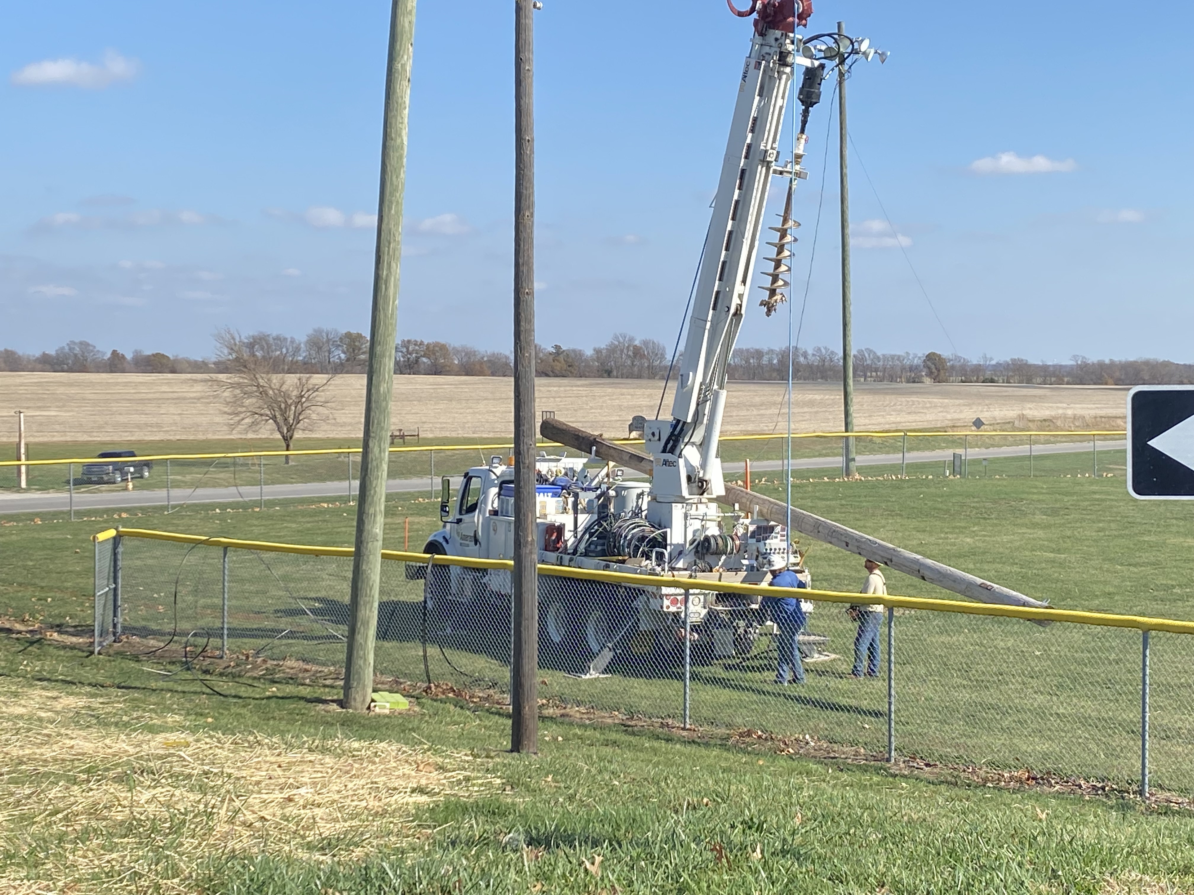 light poles being deconstructed