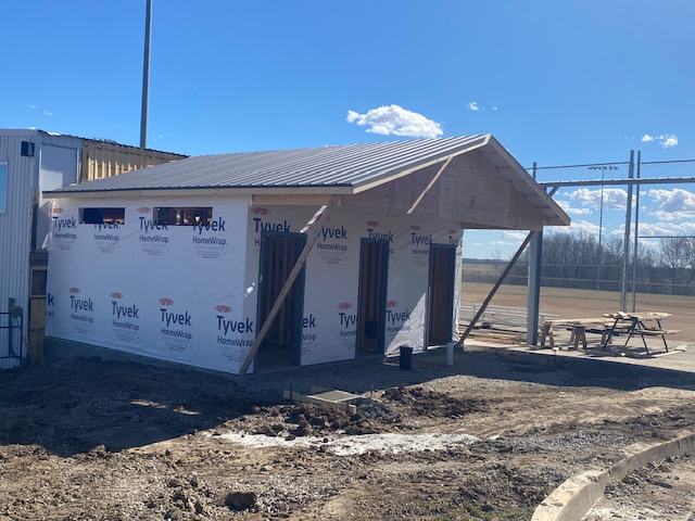 Construction progress of ball field bathroom outside