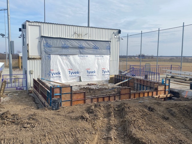 Construction progress of ball field bathroom outside