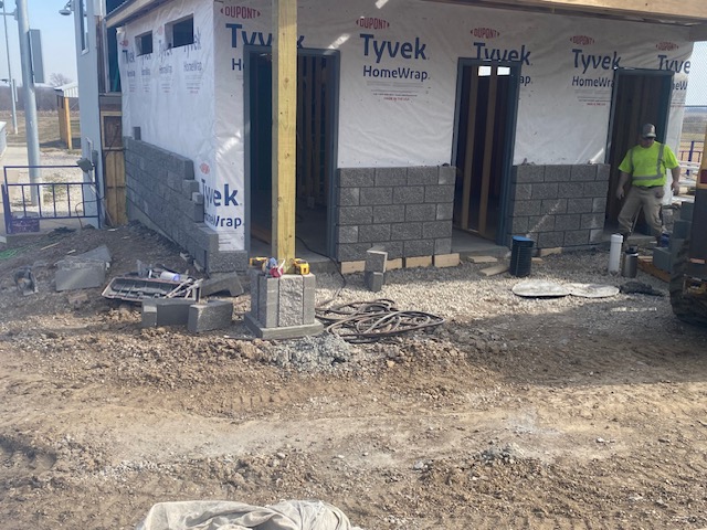 Construction progress of ball field bathroom outside