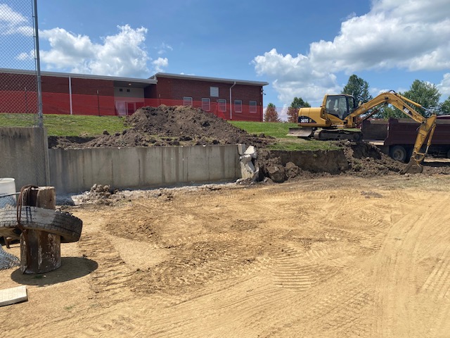 Progress on reconstructing softball field falls and dugouts