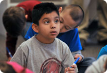 Student sitting and listening to instruction