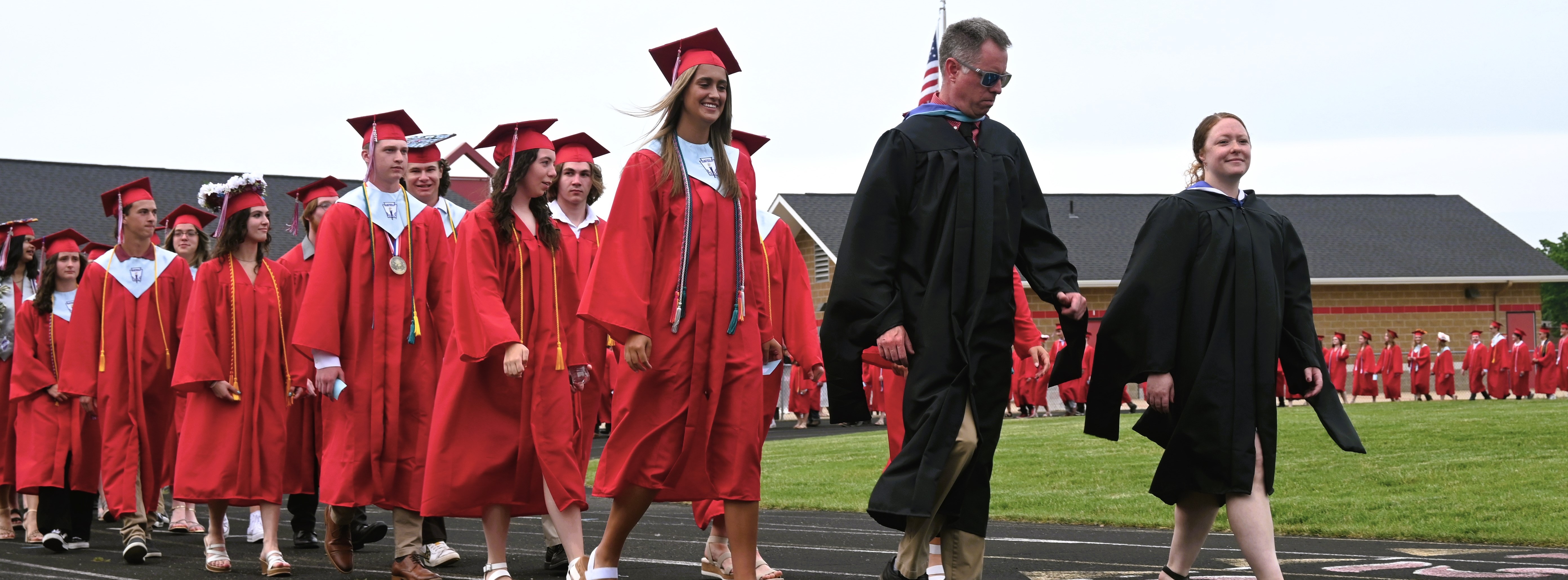 graduates walking together