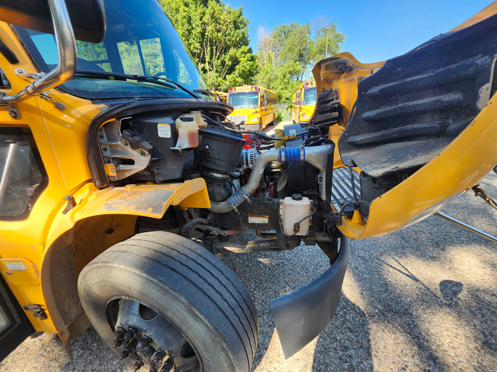 passenger side school bus engine