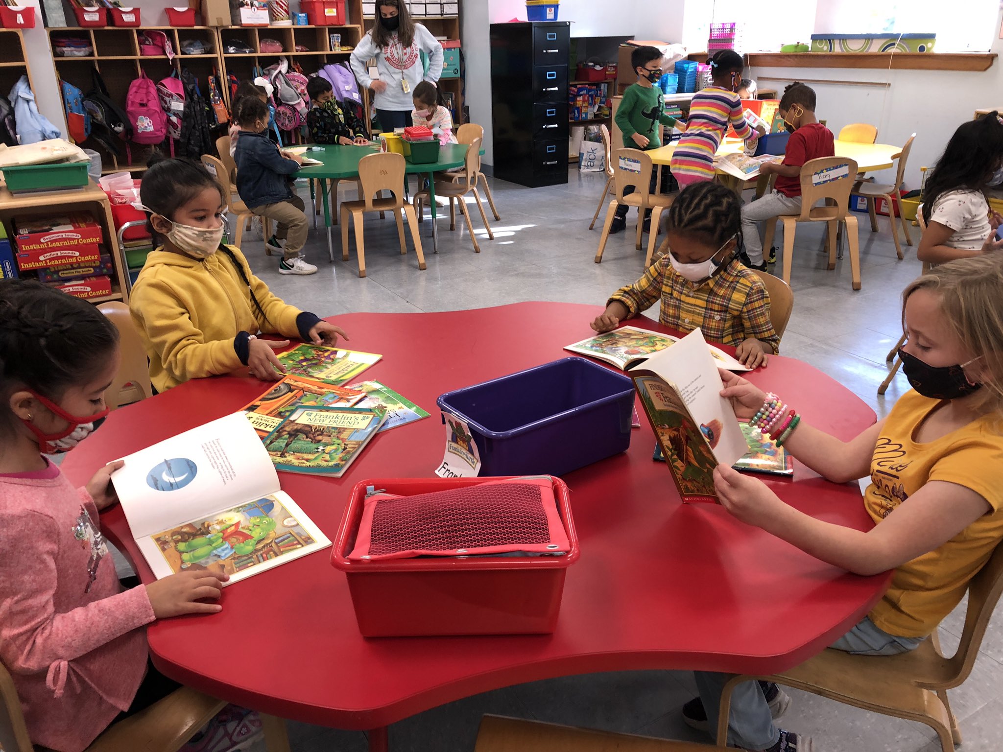 Students reading at a table