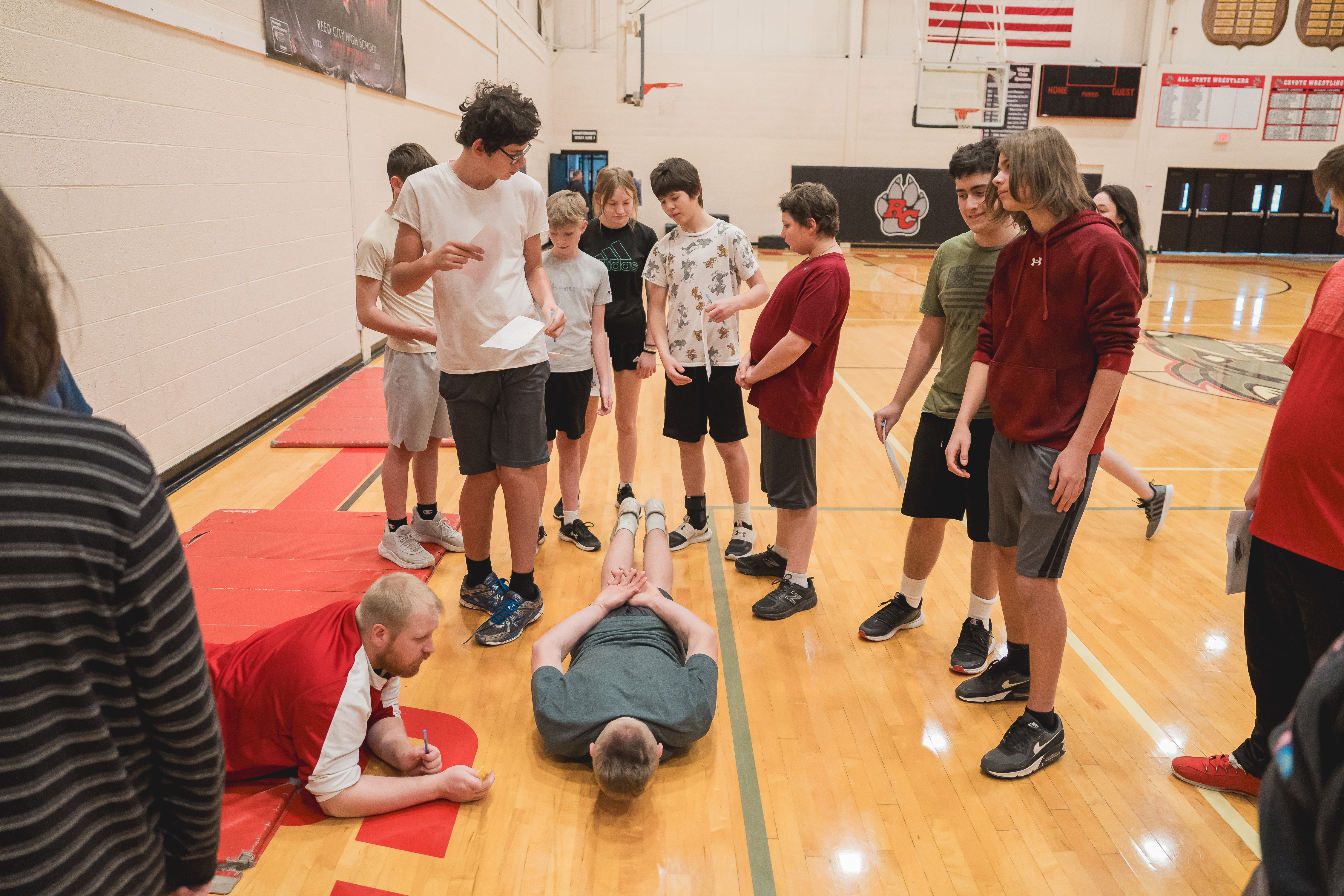 Reed City High School students and teacher in gym