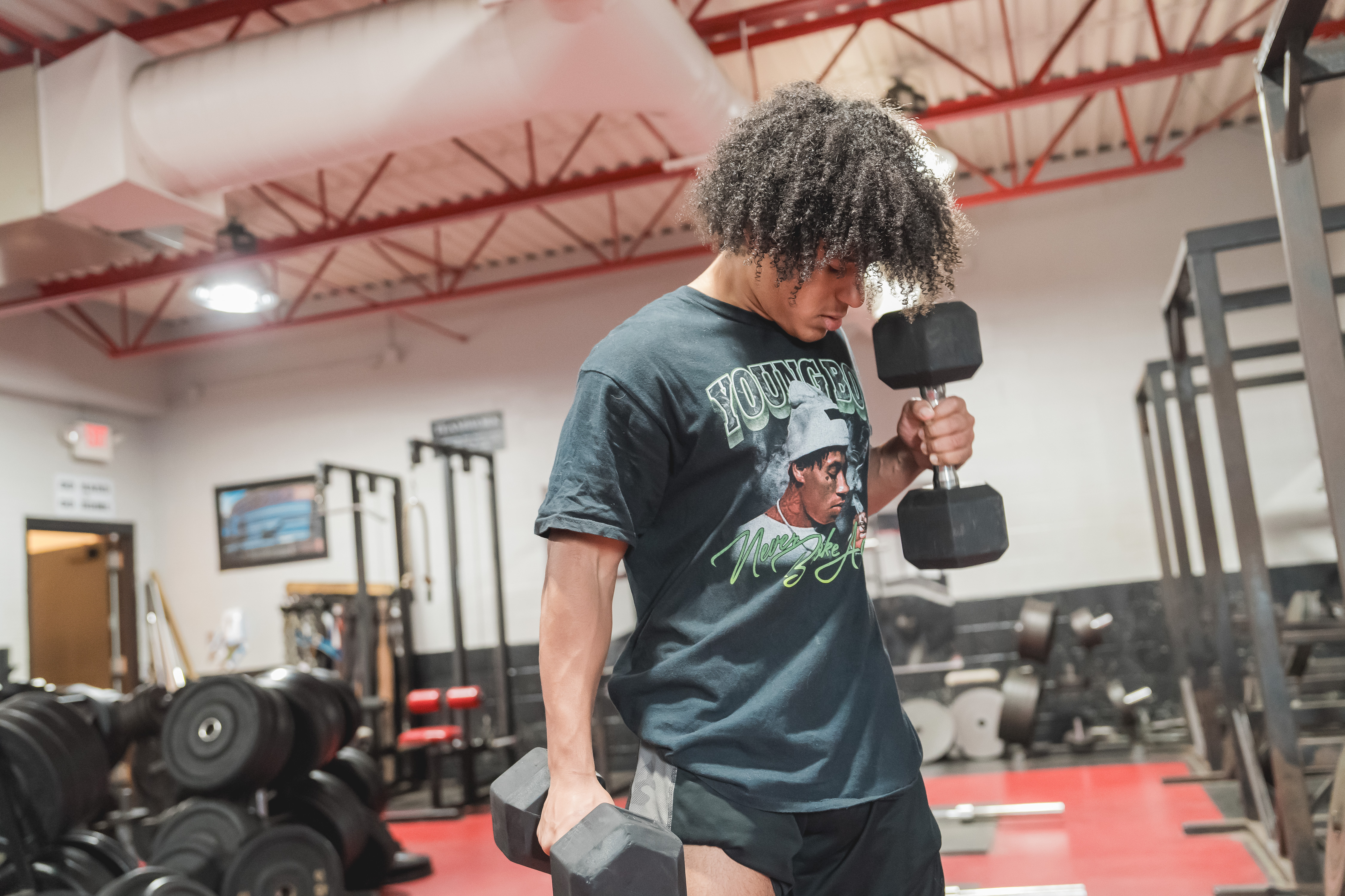 Reed City High School student working out in weight room