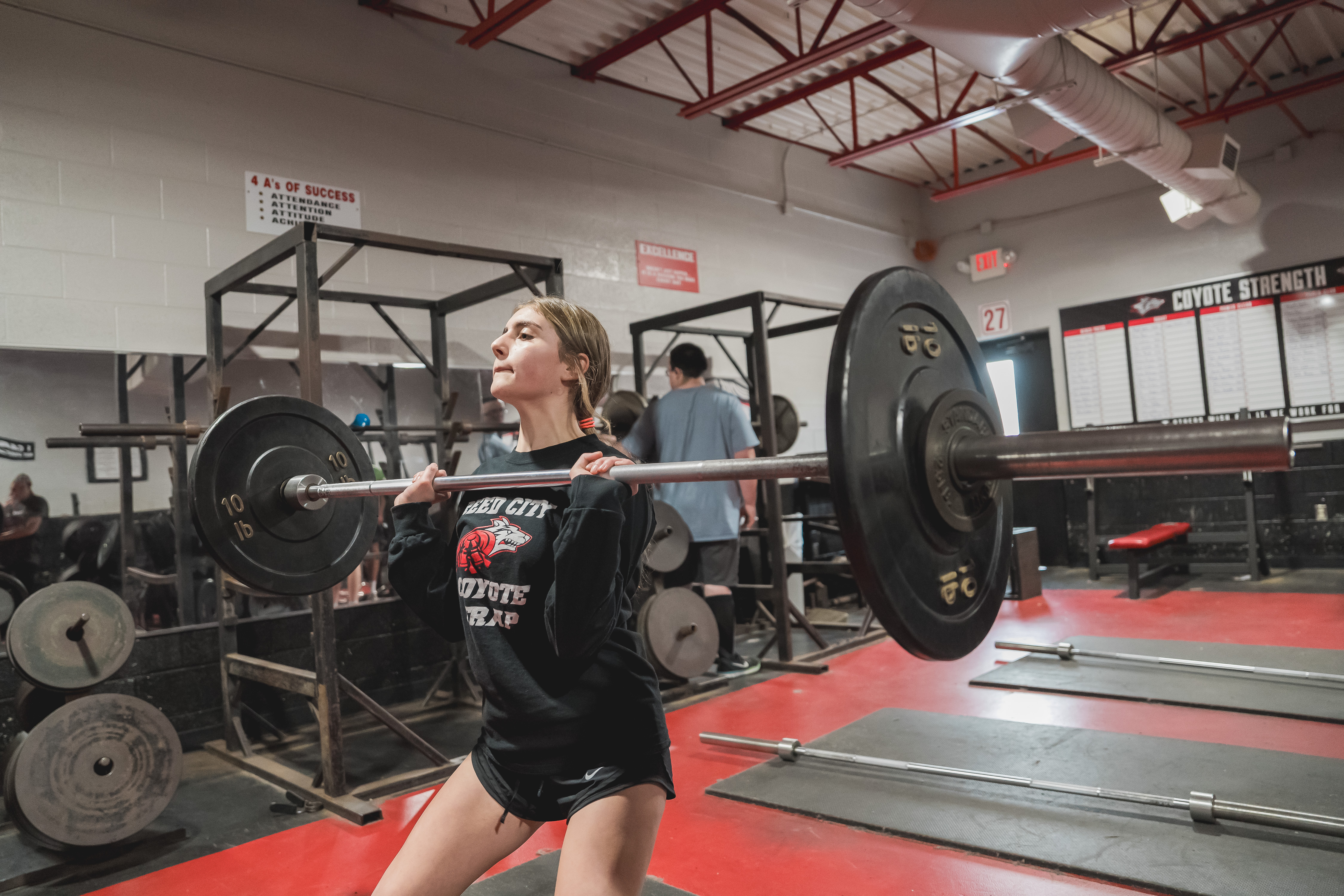 Reed City High School student in weight room