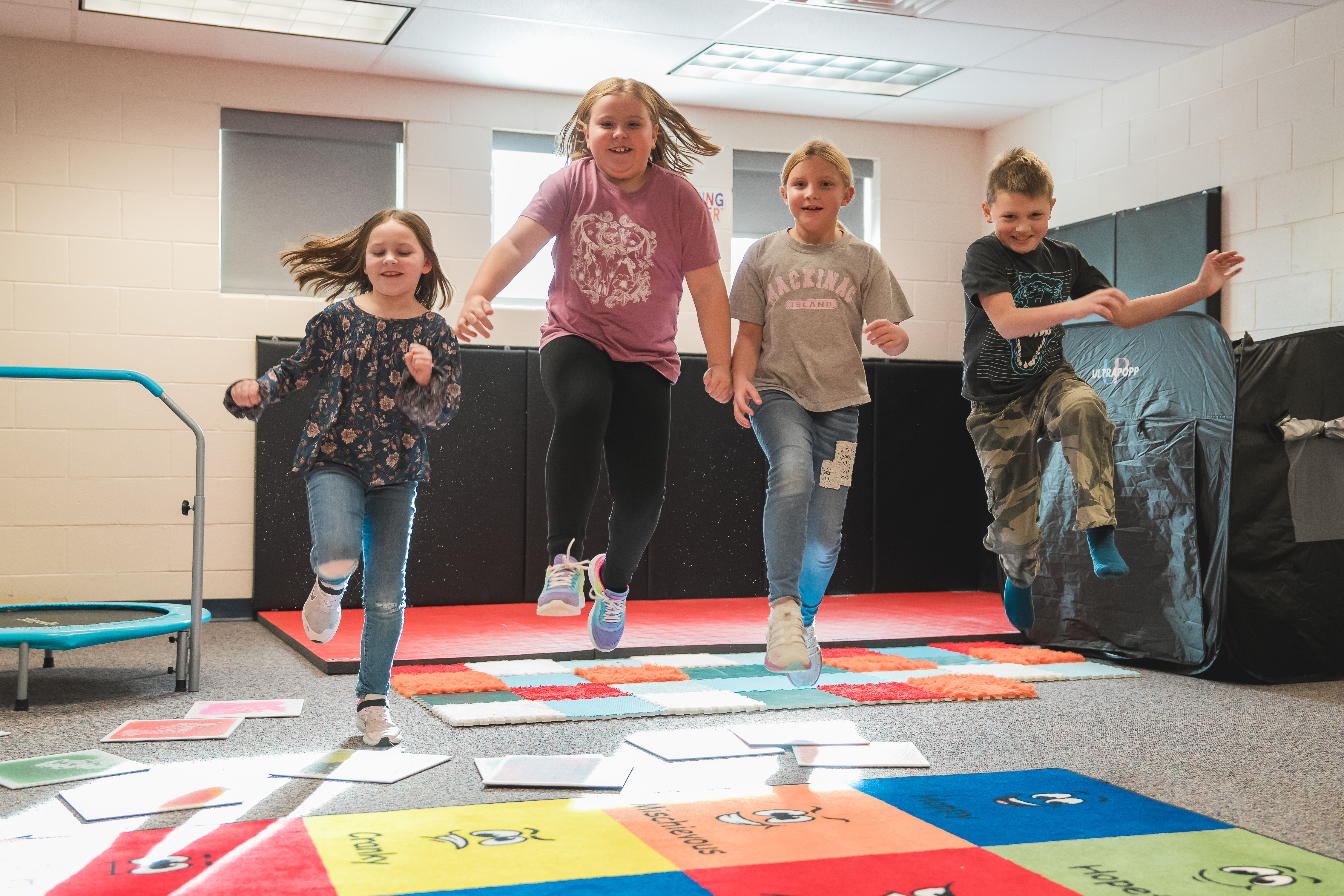 GT Norman Students jumping in classroom