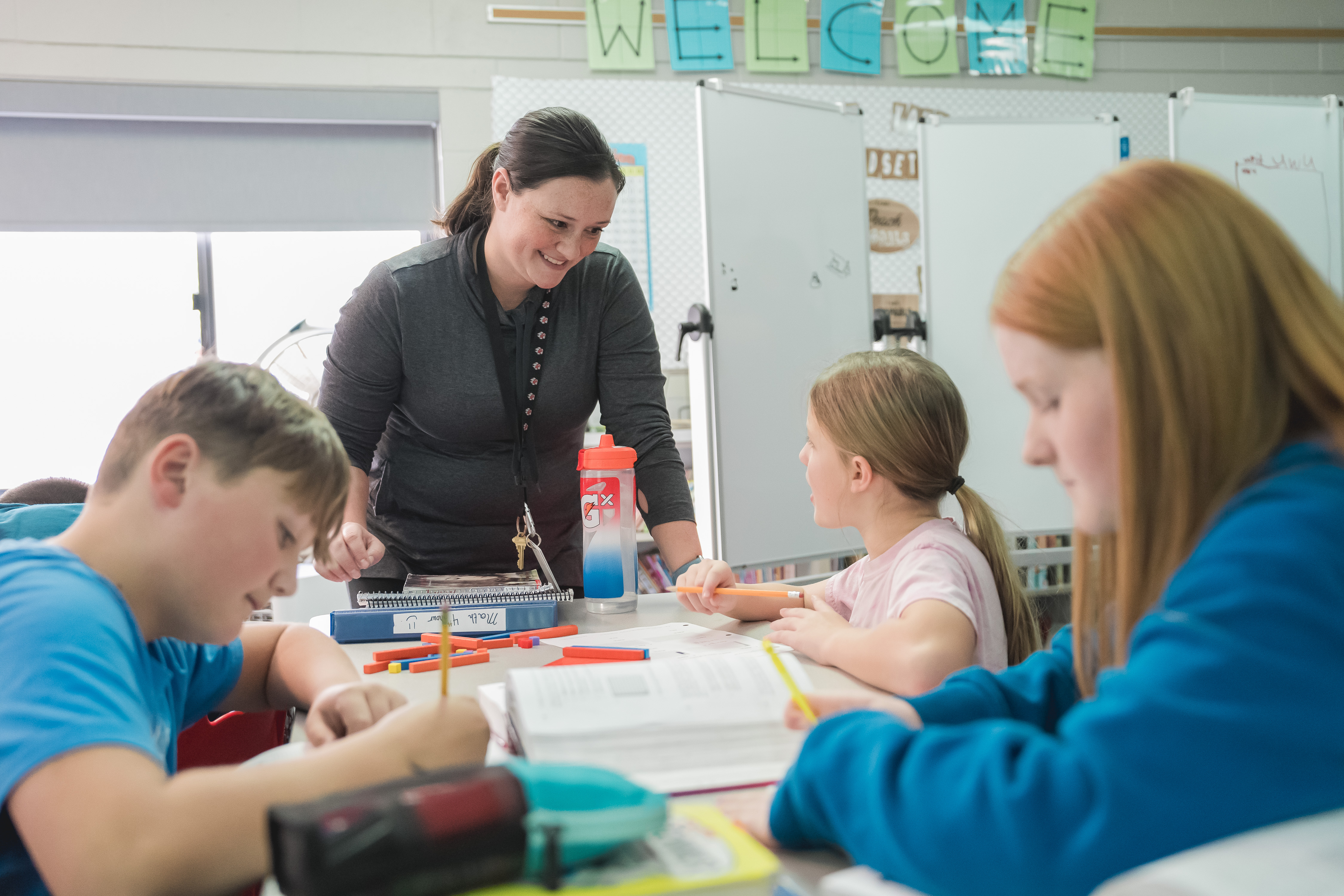 Reed City Middle School teacher working with her students