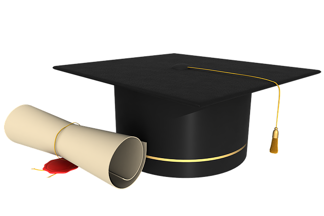 Diploma and graduation cap.