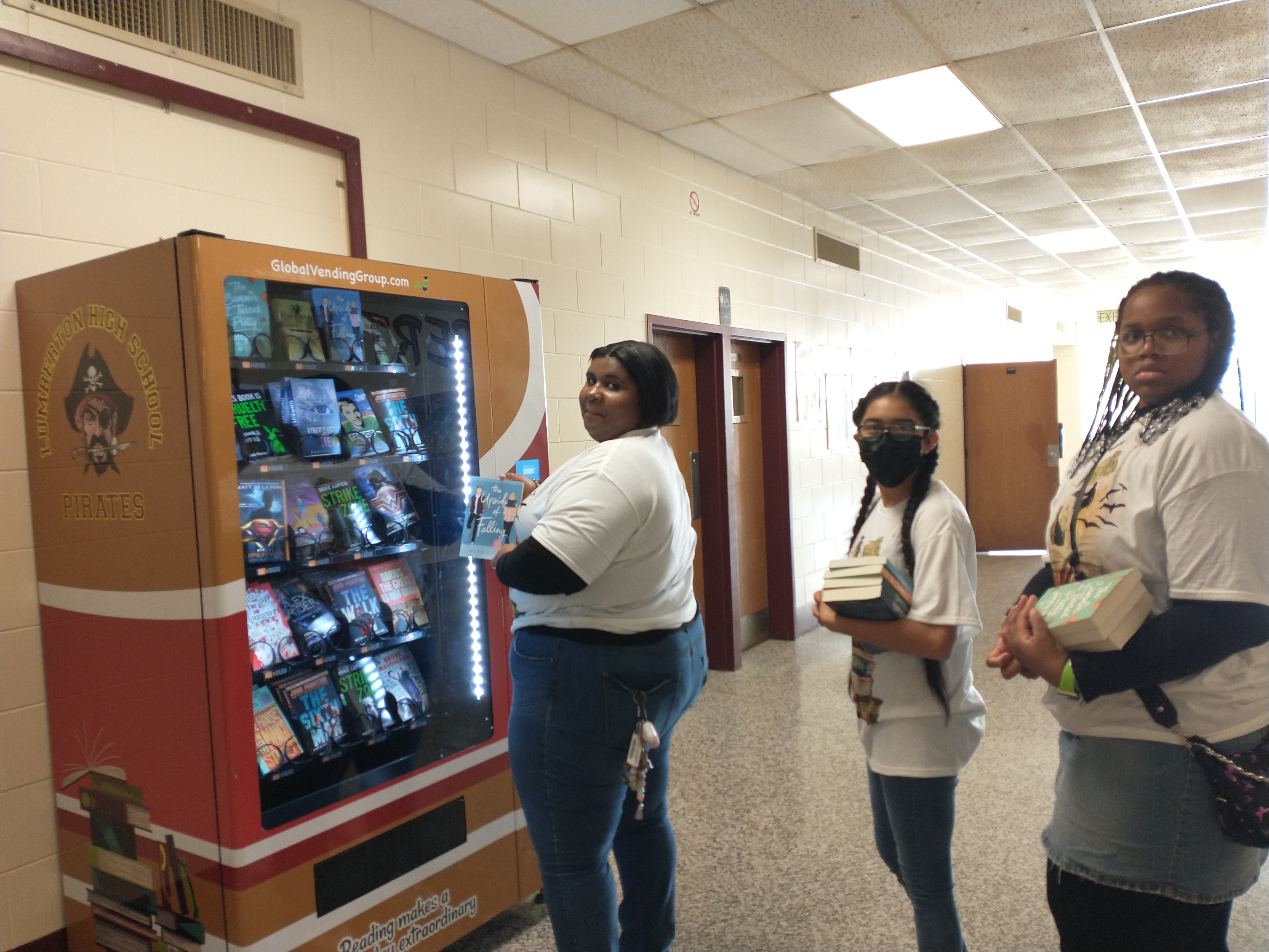 Students at book vending machine