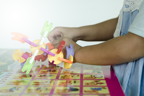 A photo of a kid playing.