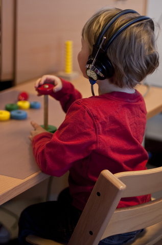 A photo of a kid playing.