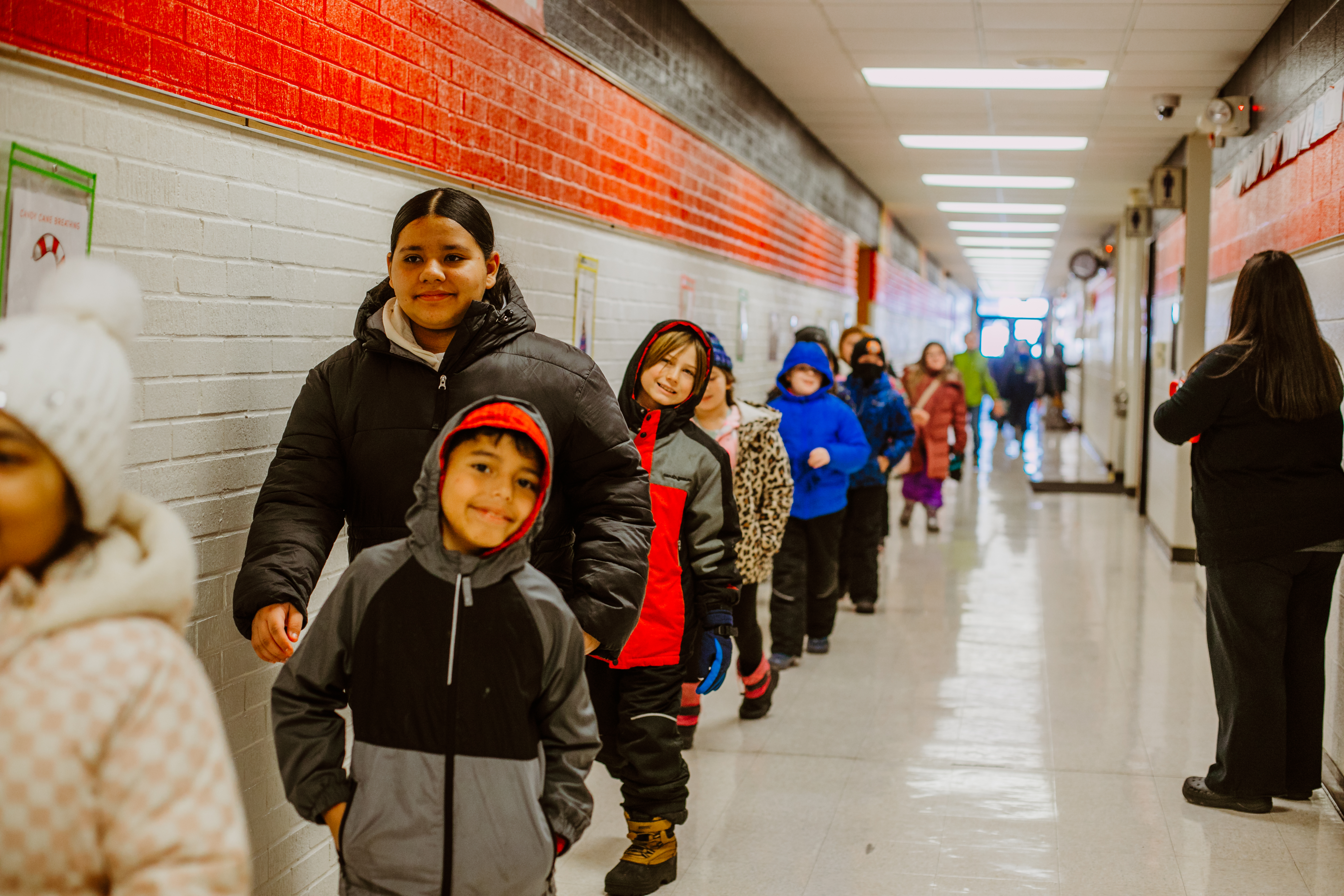 students lined up in hallway