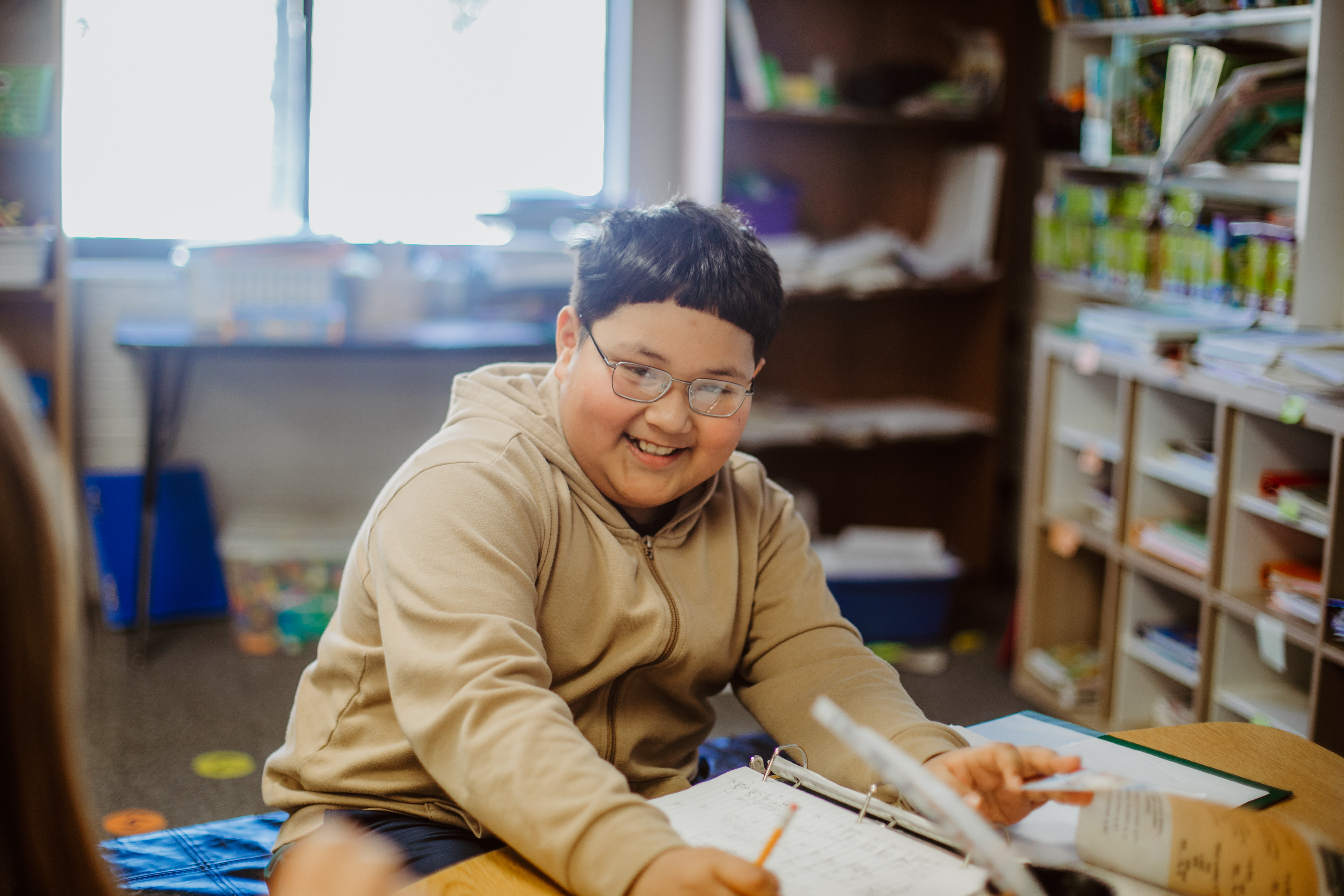 student smiling in classroom