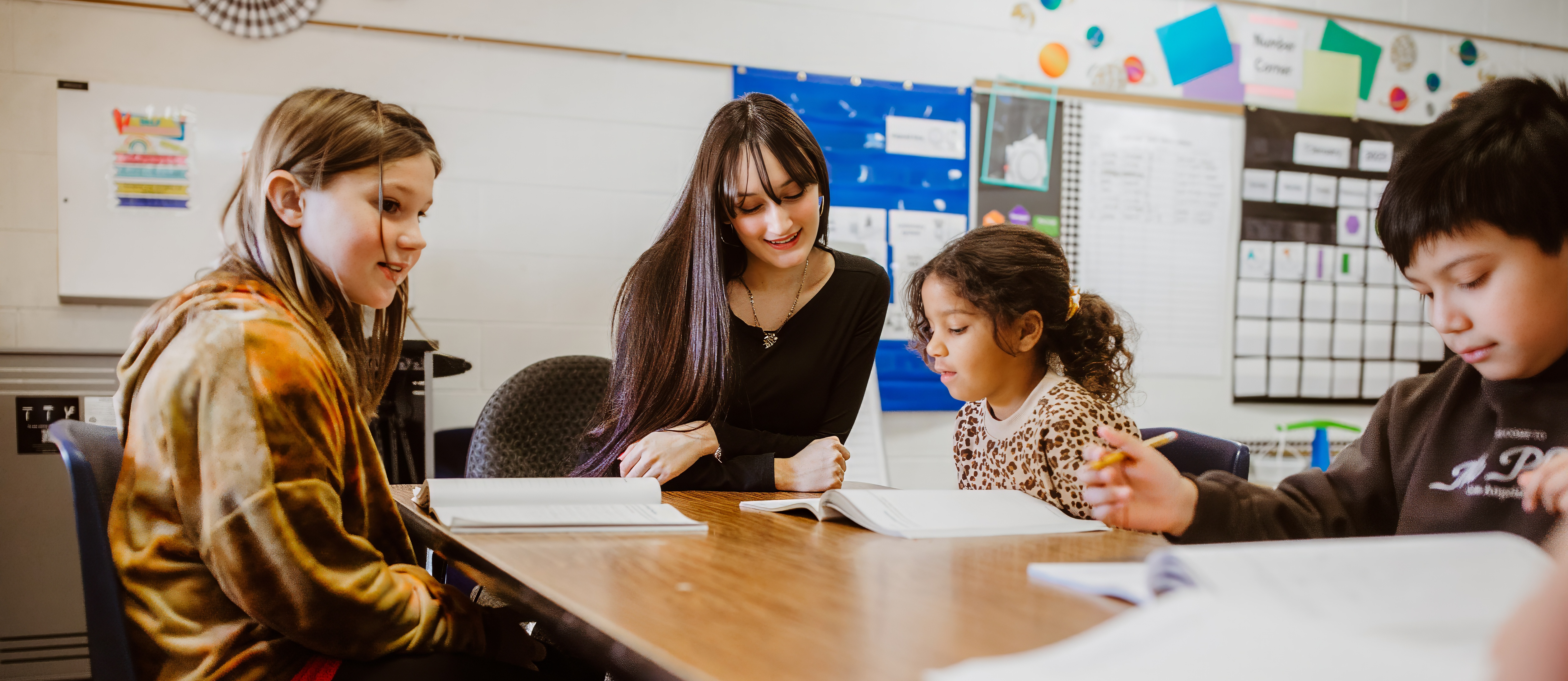 High school students visiting the elementary class